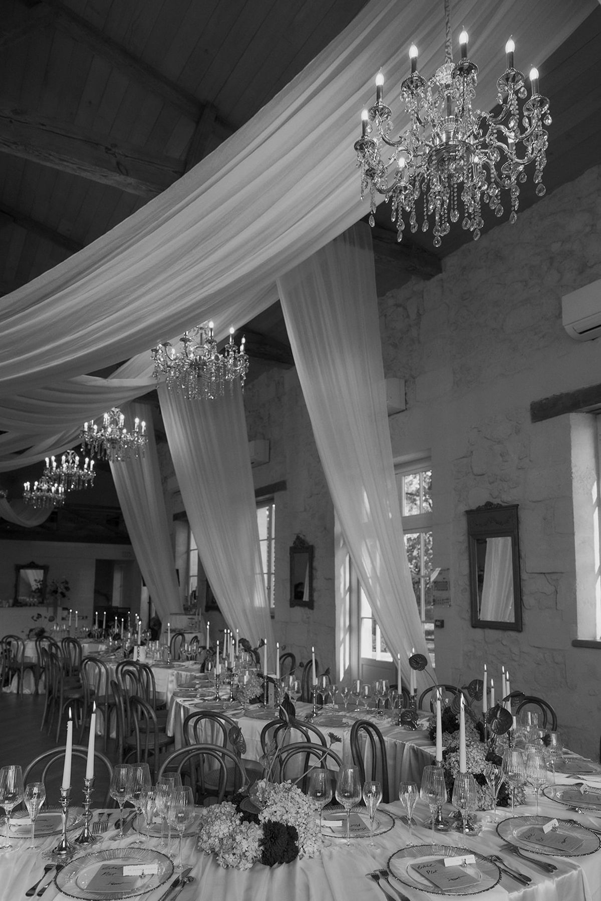 Long view of the draped reception room, black and white