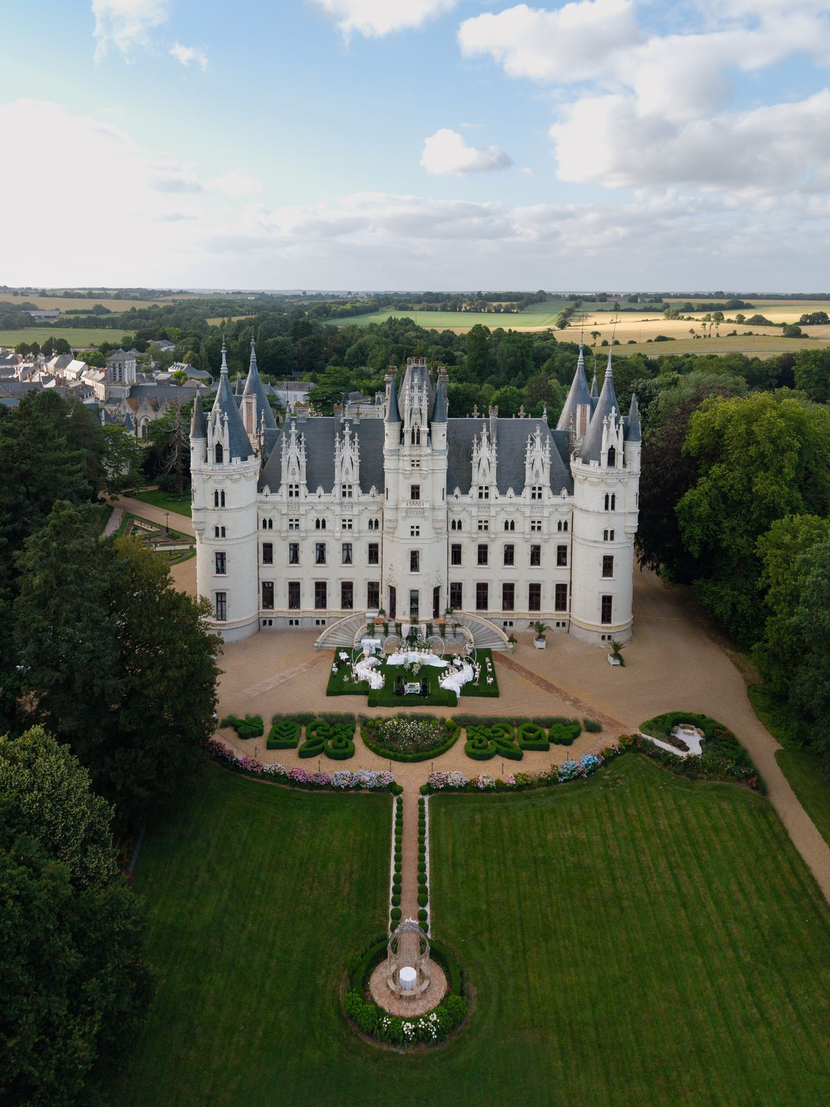 Aerial view of Chateau Challain with the ceremony set in the formal parterre