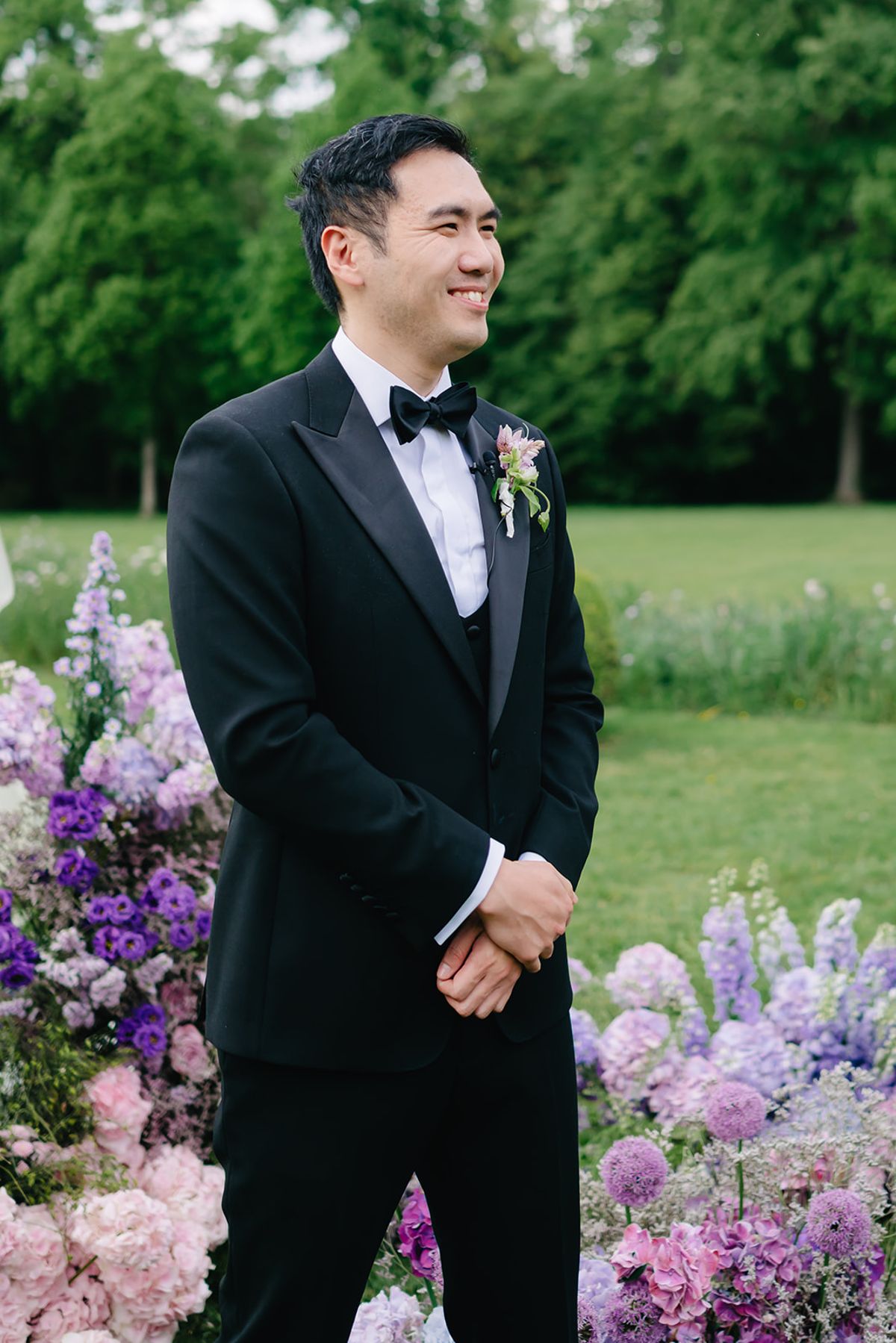 Ruiji in his boutonniere ahead of the ceremony, close portrait