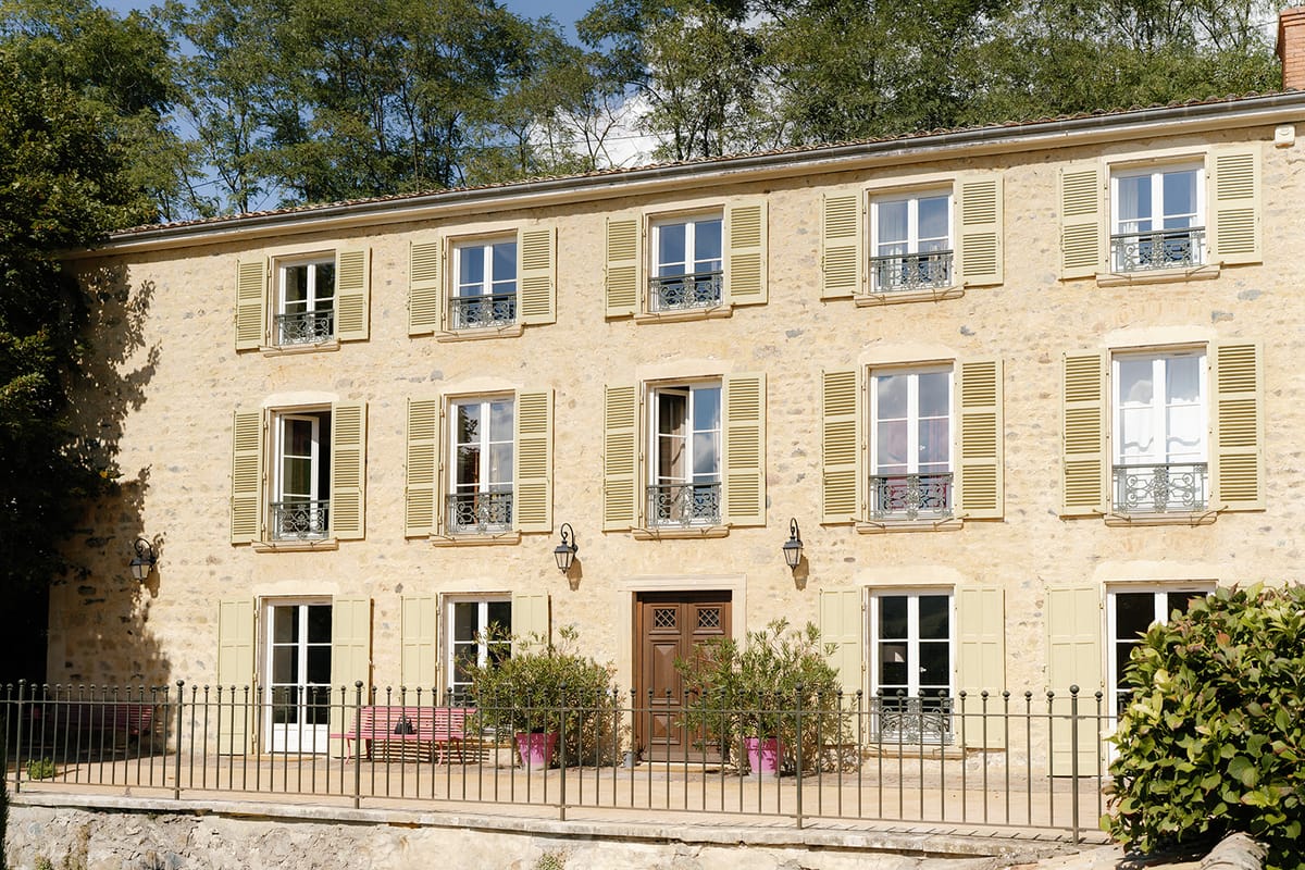 The stone facade of Domaine de Vavril in the Beaujolais countryside