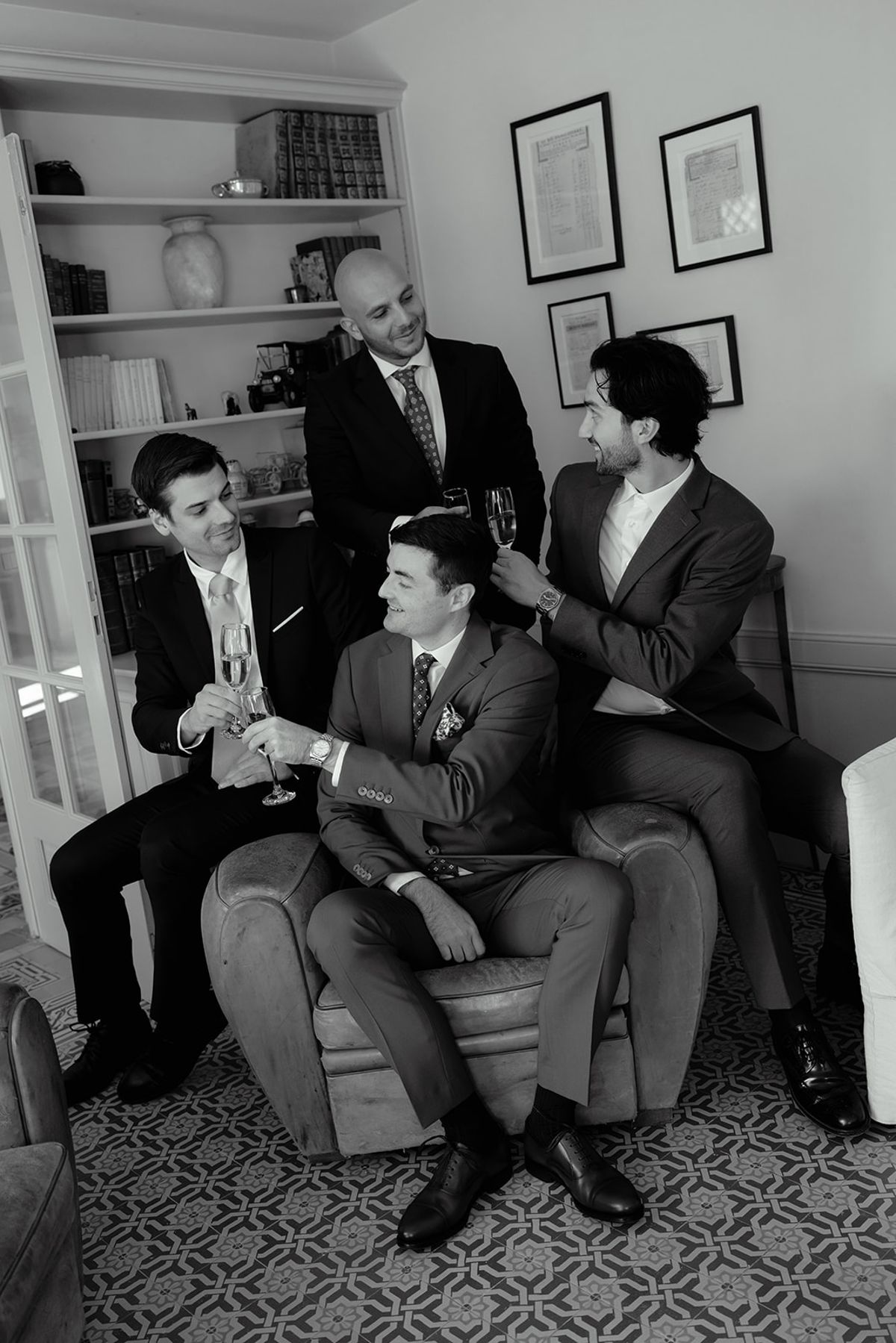 The groom and his groomsmen dressing at Domaine de Vavril