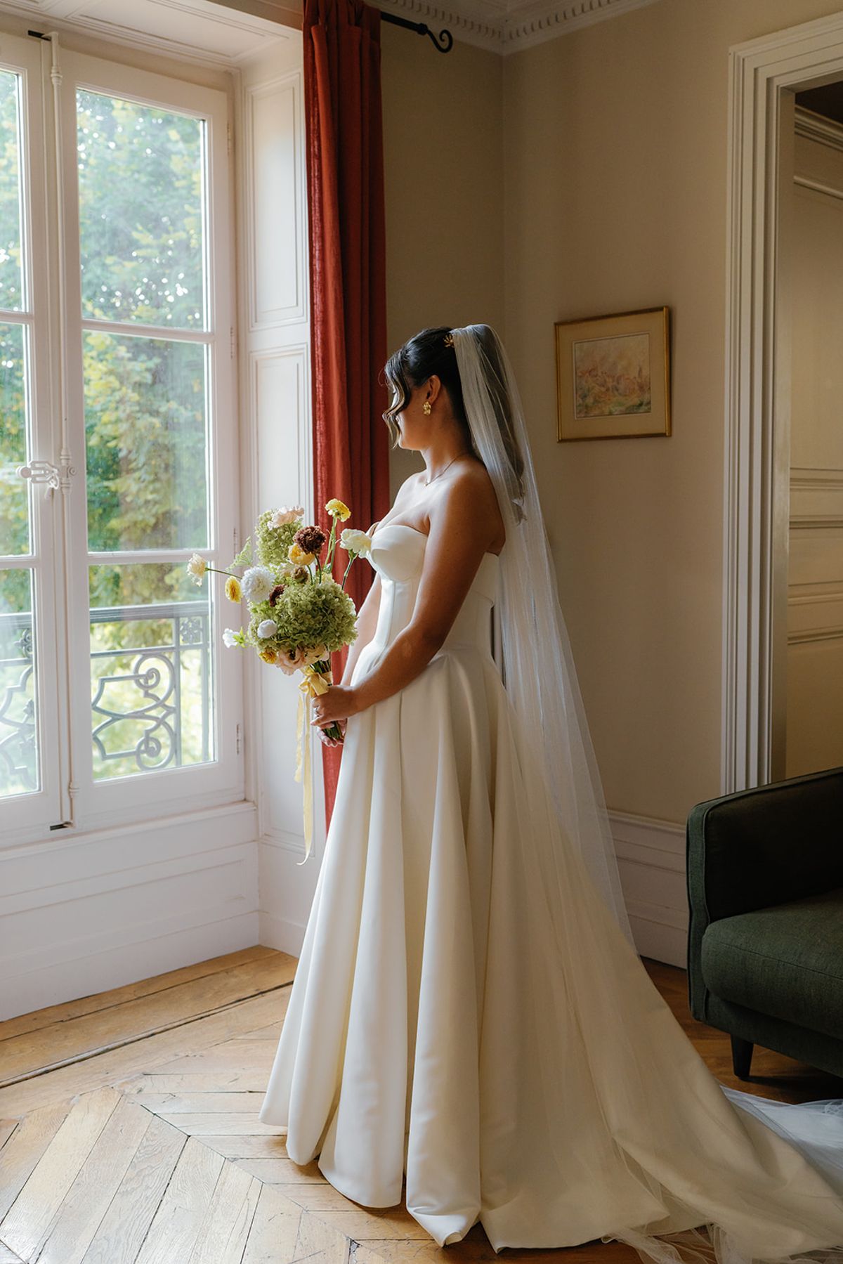 A full length portrait of the bride before the ceremony