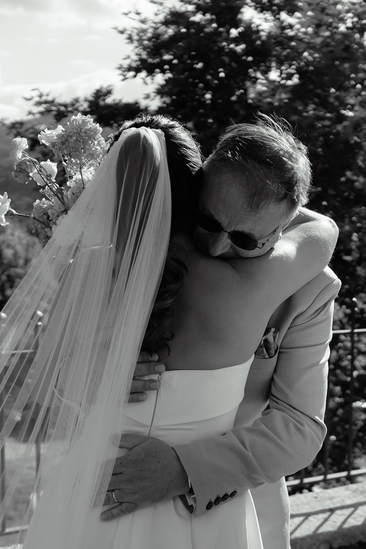 The couple embrace at the end of the ceremony