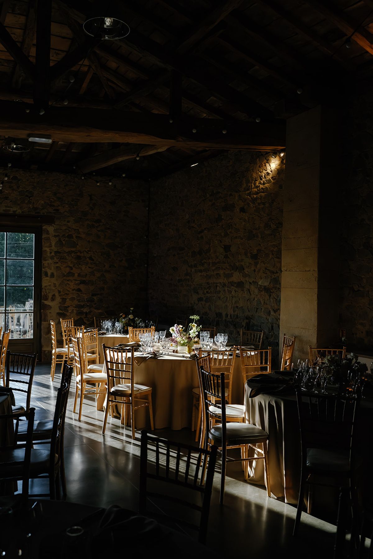 The stone reception space set for the evening