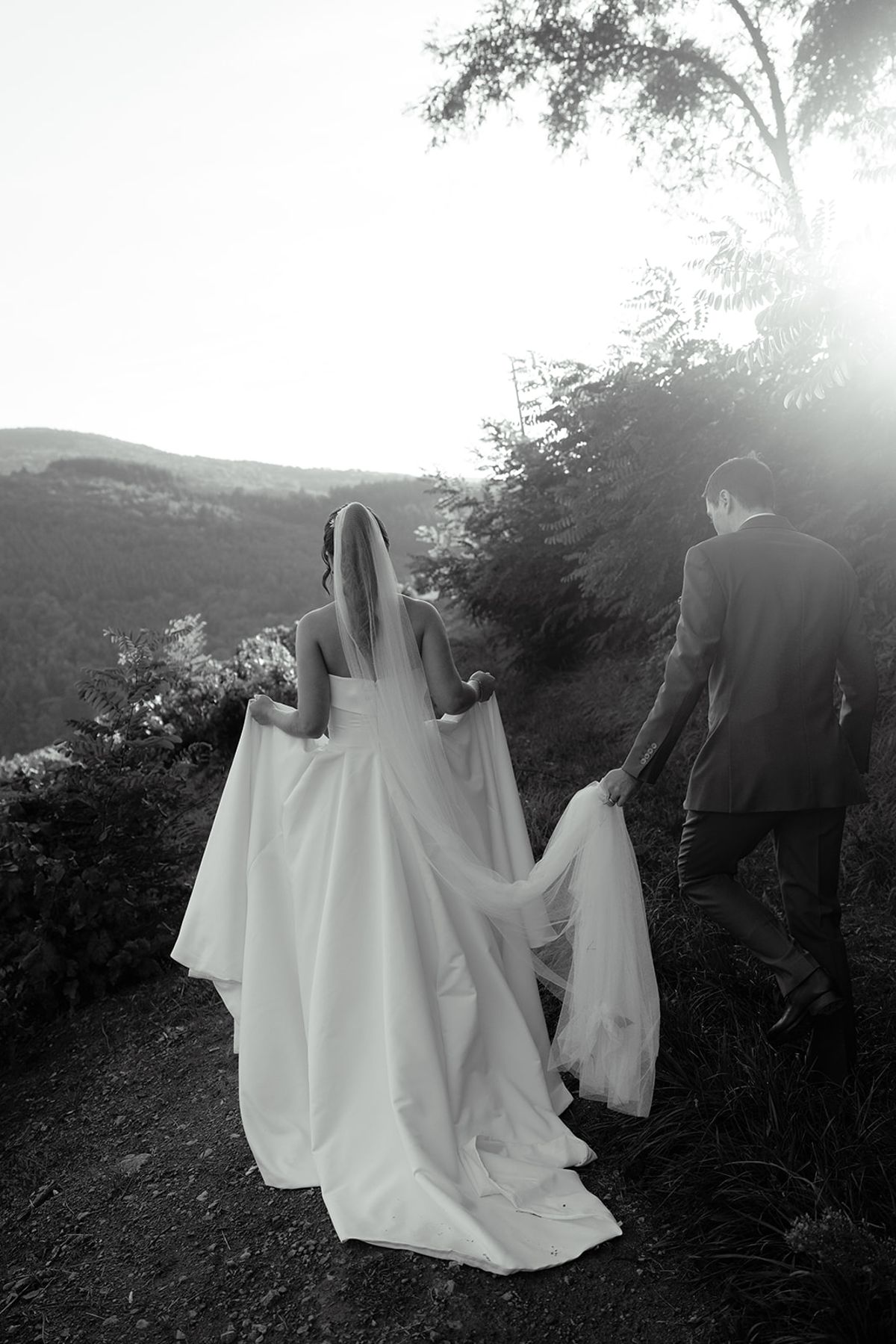 Claire and Baptiste walking together in the evening light