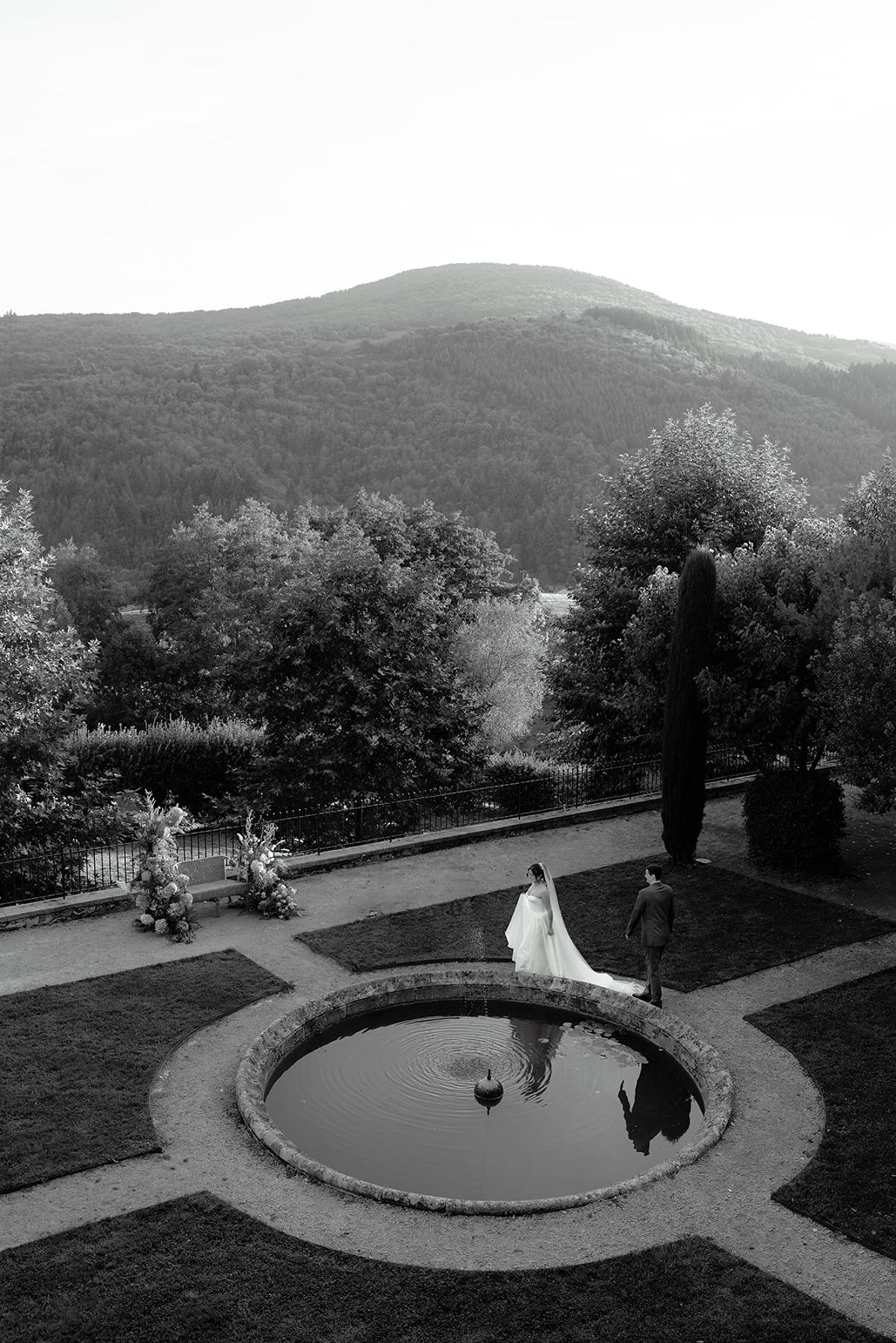 The couple in the garden at dusk, photographed from above
