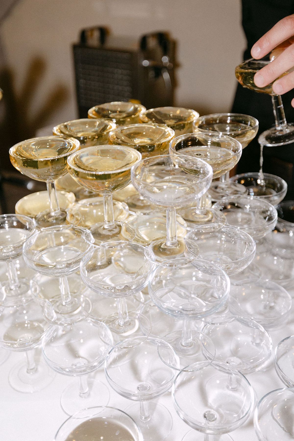 Champagne coupes stacked and ready for the cocktail hour.