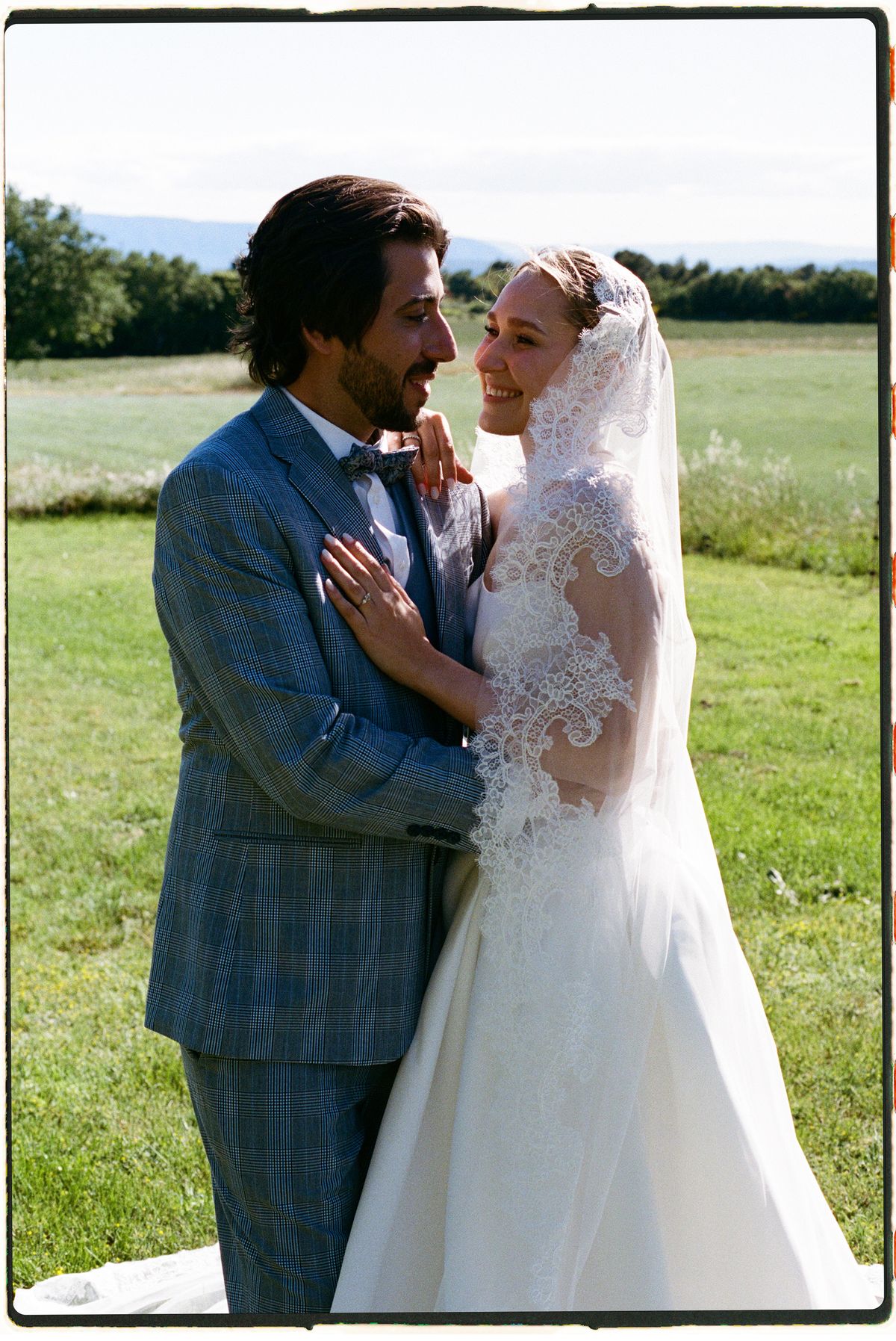 Bride and groom embracing during the reception