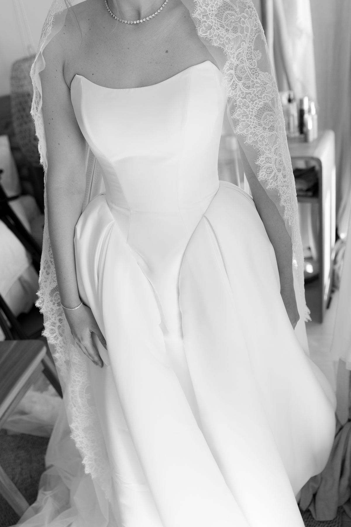 Close-up of the bride's wedding gown bodice
