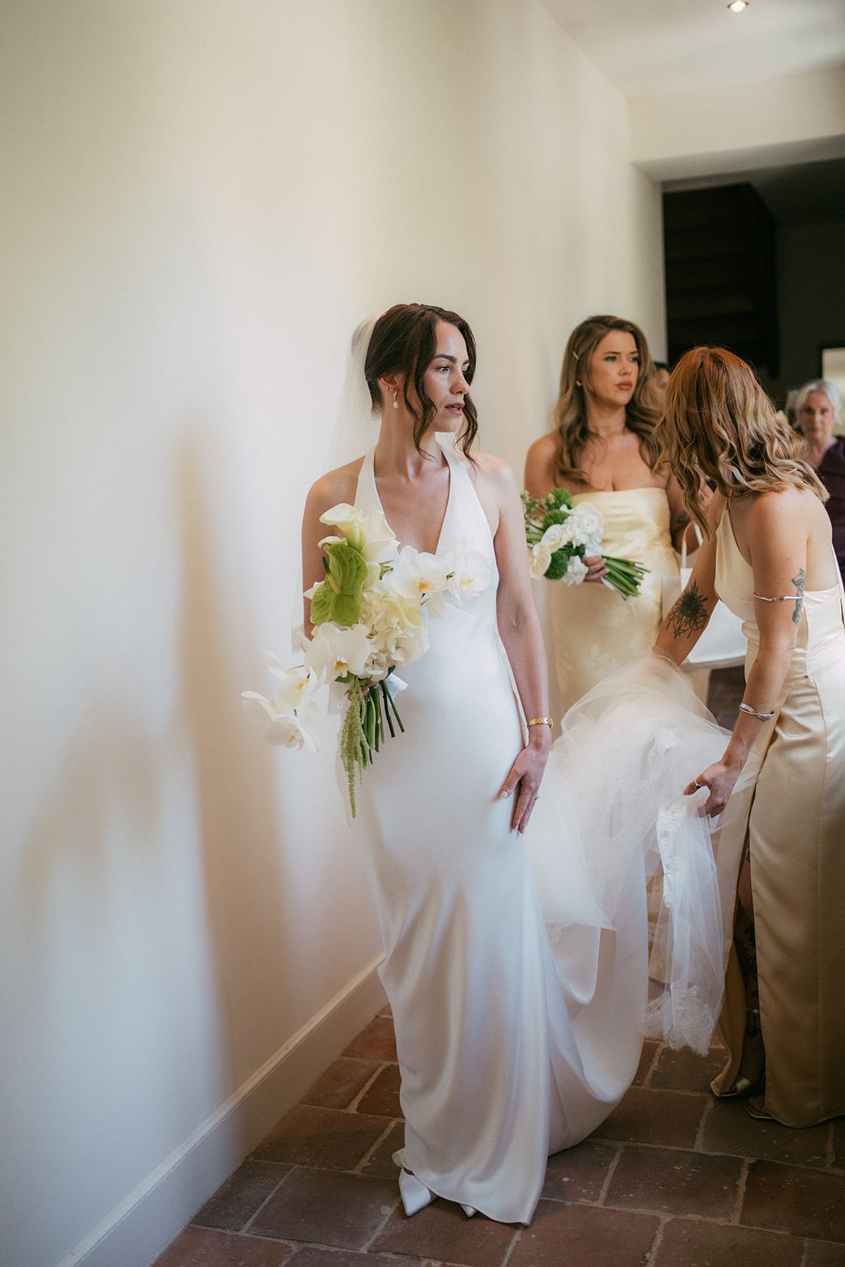 The bride and her bridesmaids with their bouquets