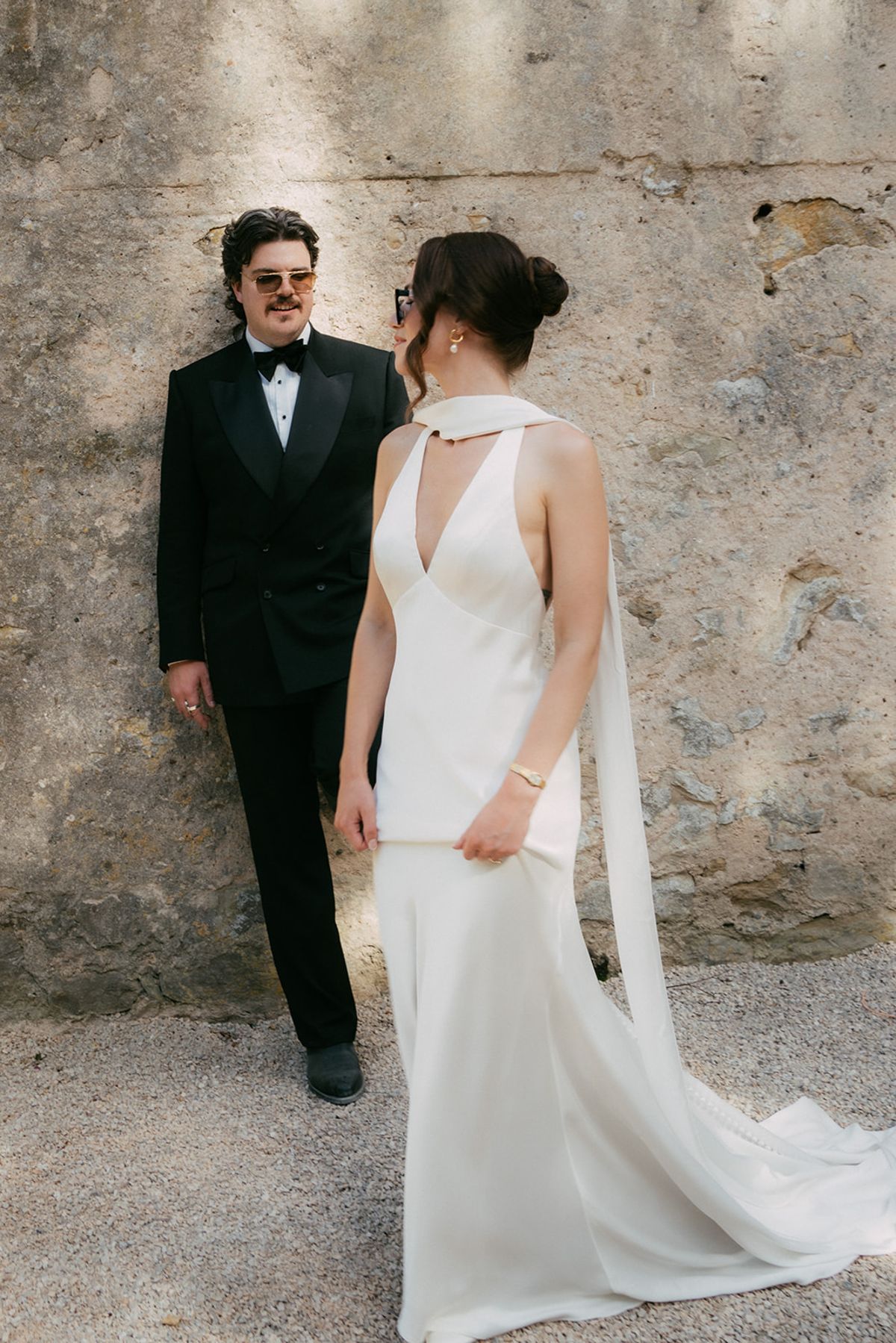 Jasmin and David on the gravel path at Chateau du Pont Bourguet