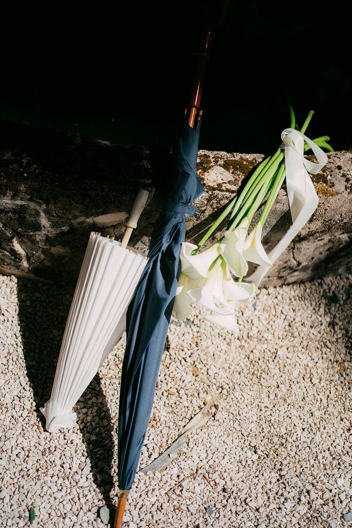 Parasols and calla lilies at Chateau du Pont Bourguet