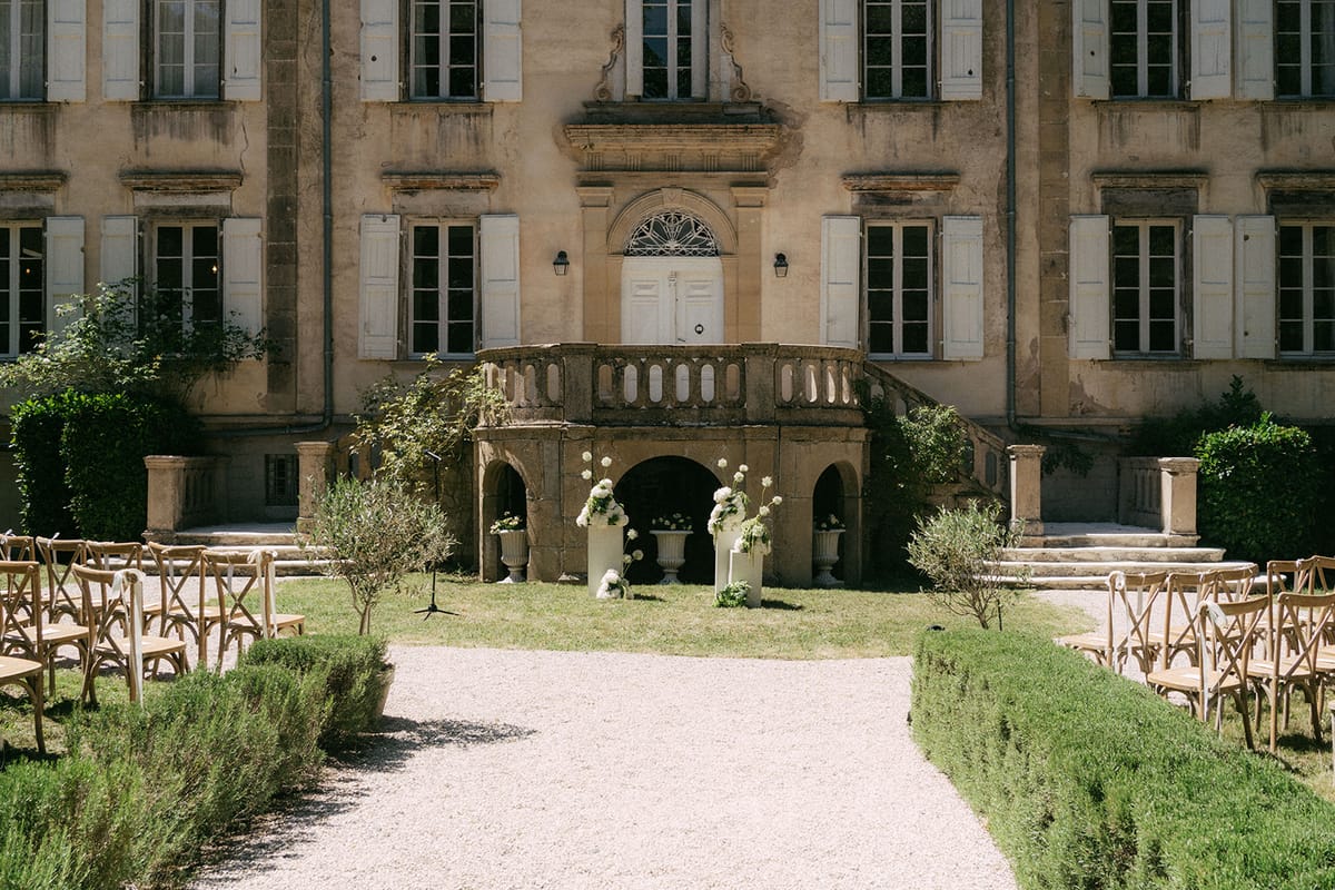 Summer ceremony flowers at the entrance to Chateau du Pont Bourguet