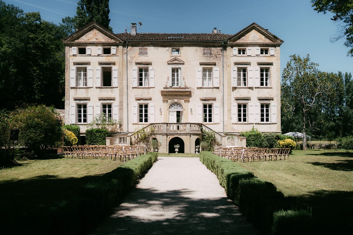 The facade and formal garden at Chateau du Pont Bourguet, Occitanie