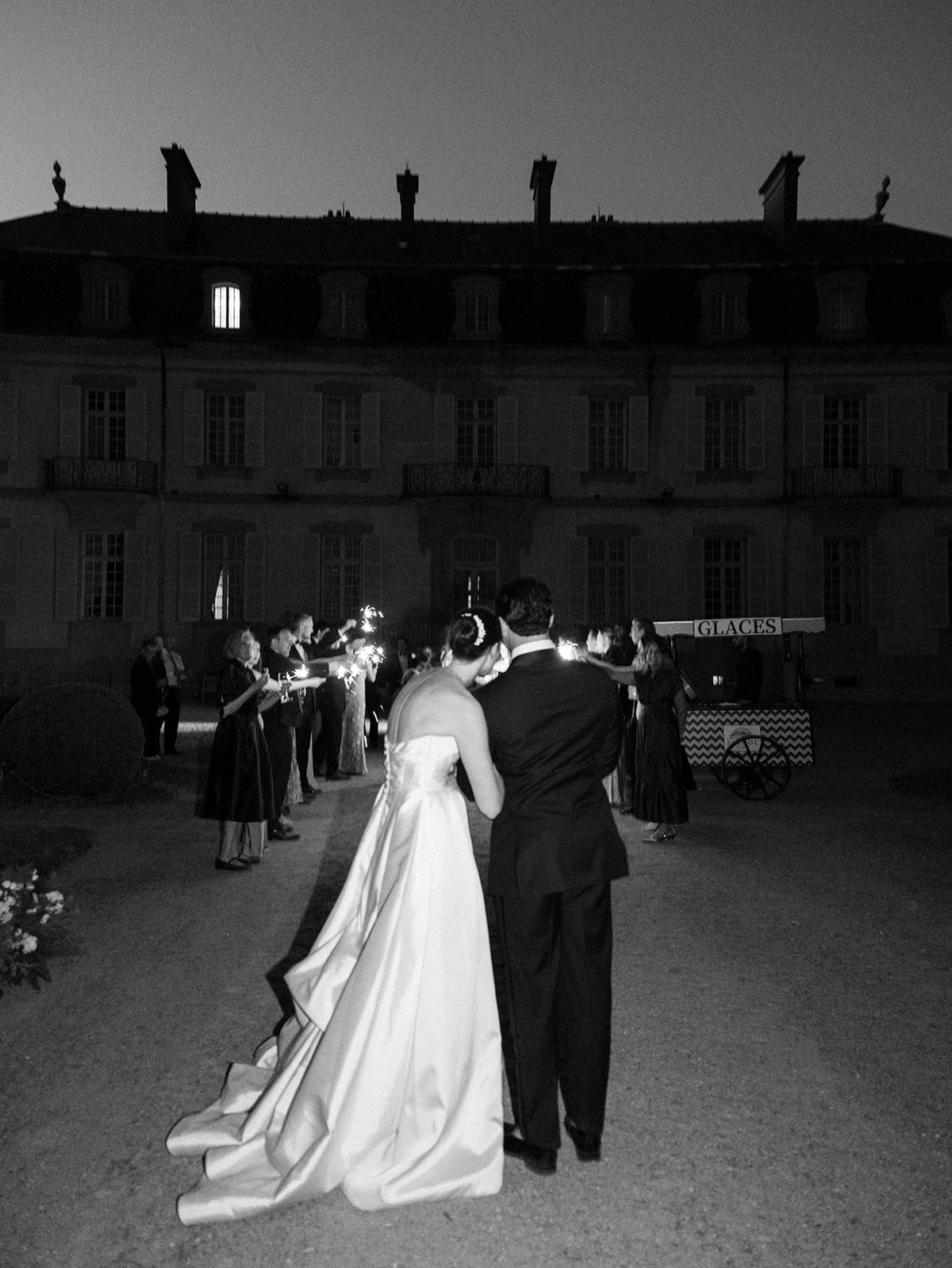 Haley and Tyler walking through the sparkler send off