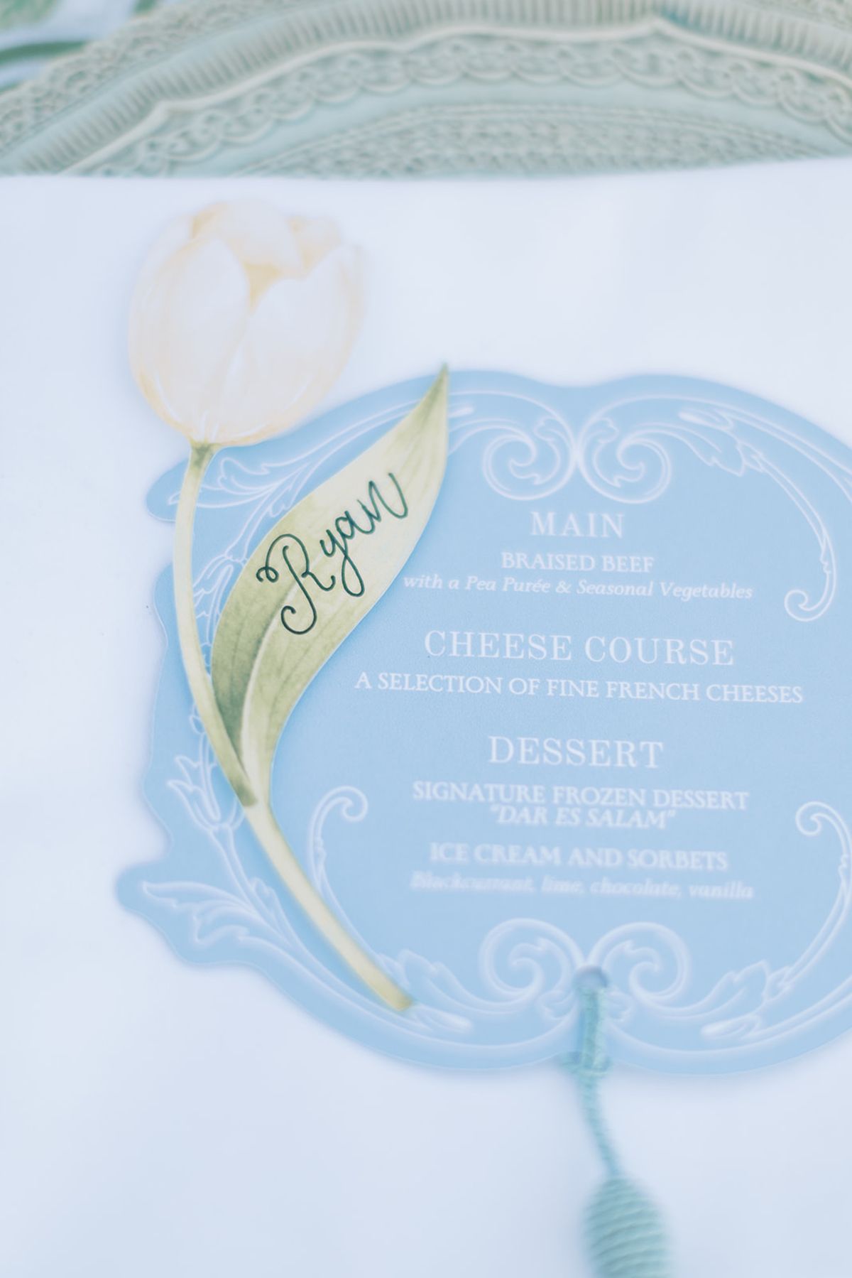 The blue menu card with its painted tulip and hand lettered name