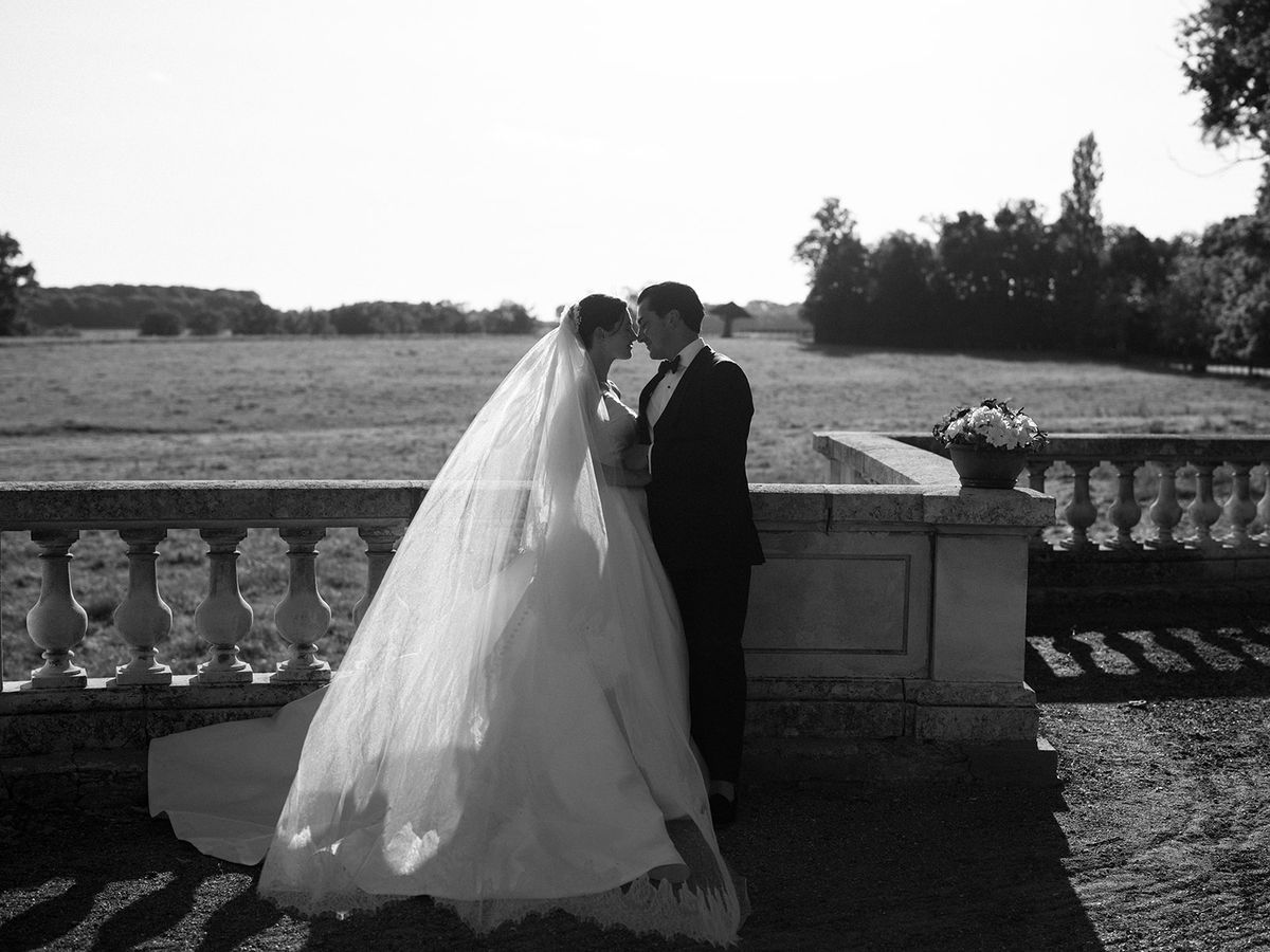 Haley and Tyler on the balustrade above the countryside