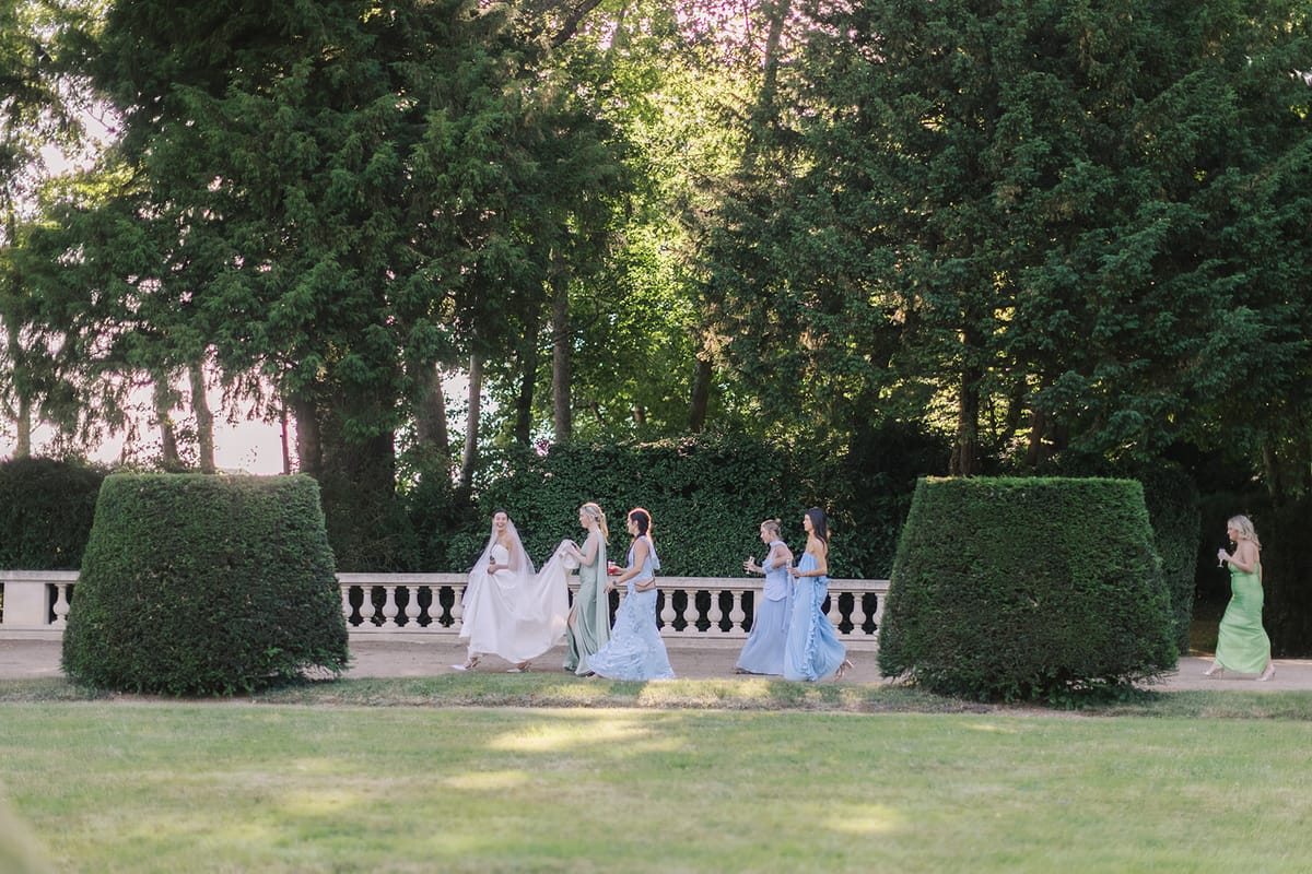 Haley and her bridesmaids walking the balustrade path