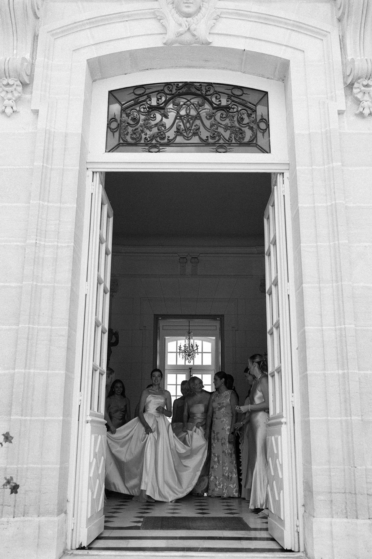 Haley and her attendants in the entrance hall at La Chassagne