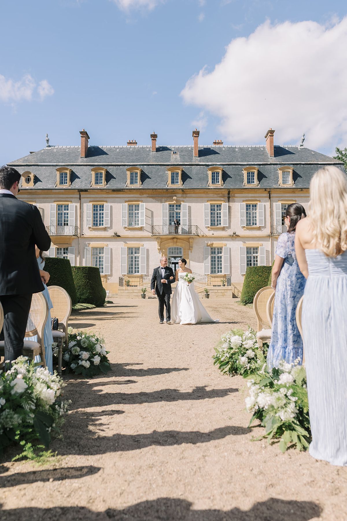 Haley walking up the aisle at La Chassagne