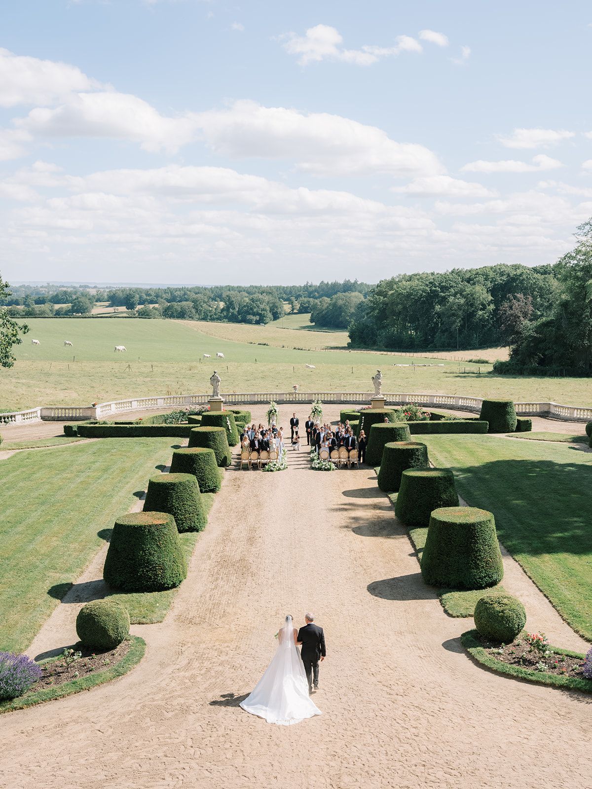 The ceremony from above, the aisle running through the topiary