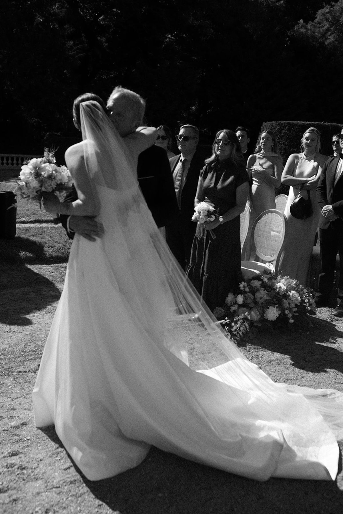 Haley at the head of the aisle, her veil trailing behind