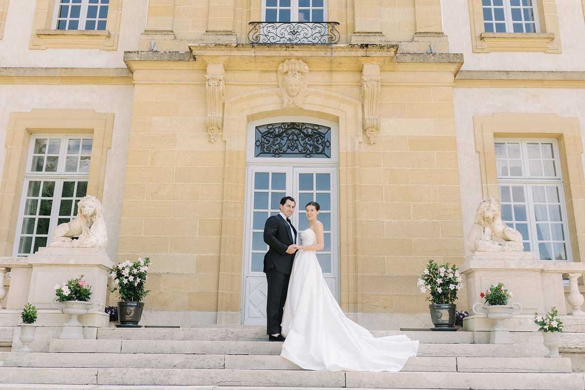 Haley and Tyler on the steps of the chateau at La Chassagne
