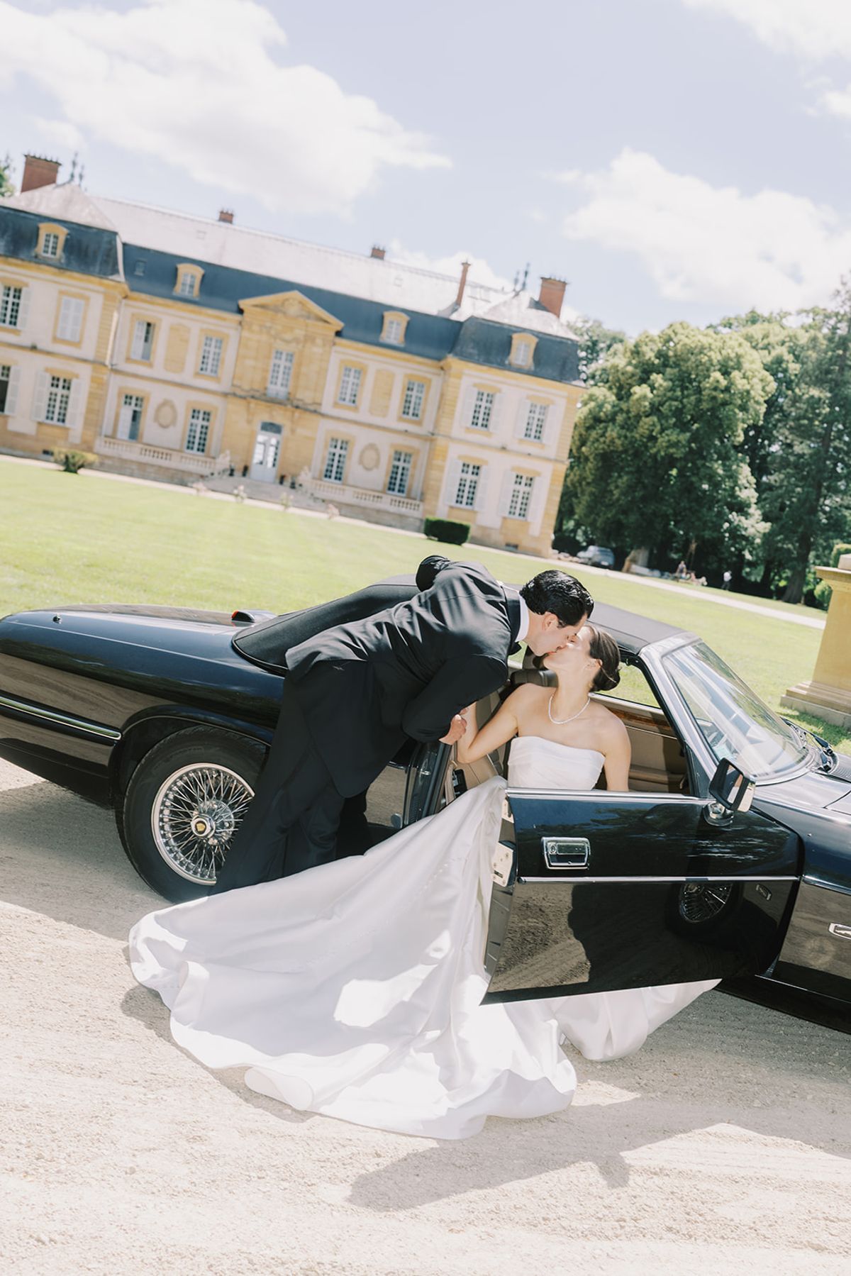 Haley and Tyler at the vintage car, her train across the gravel