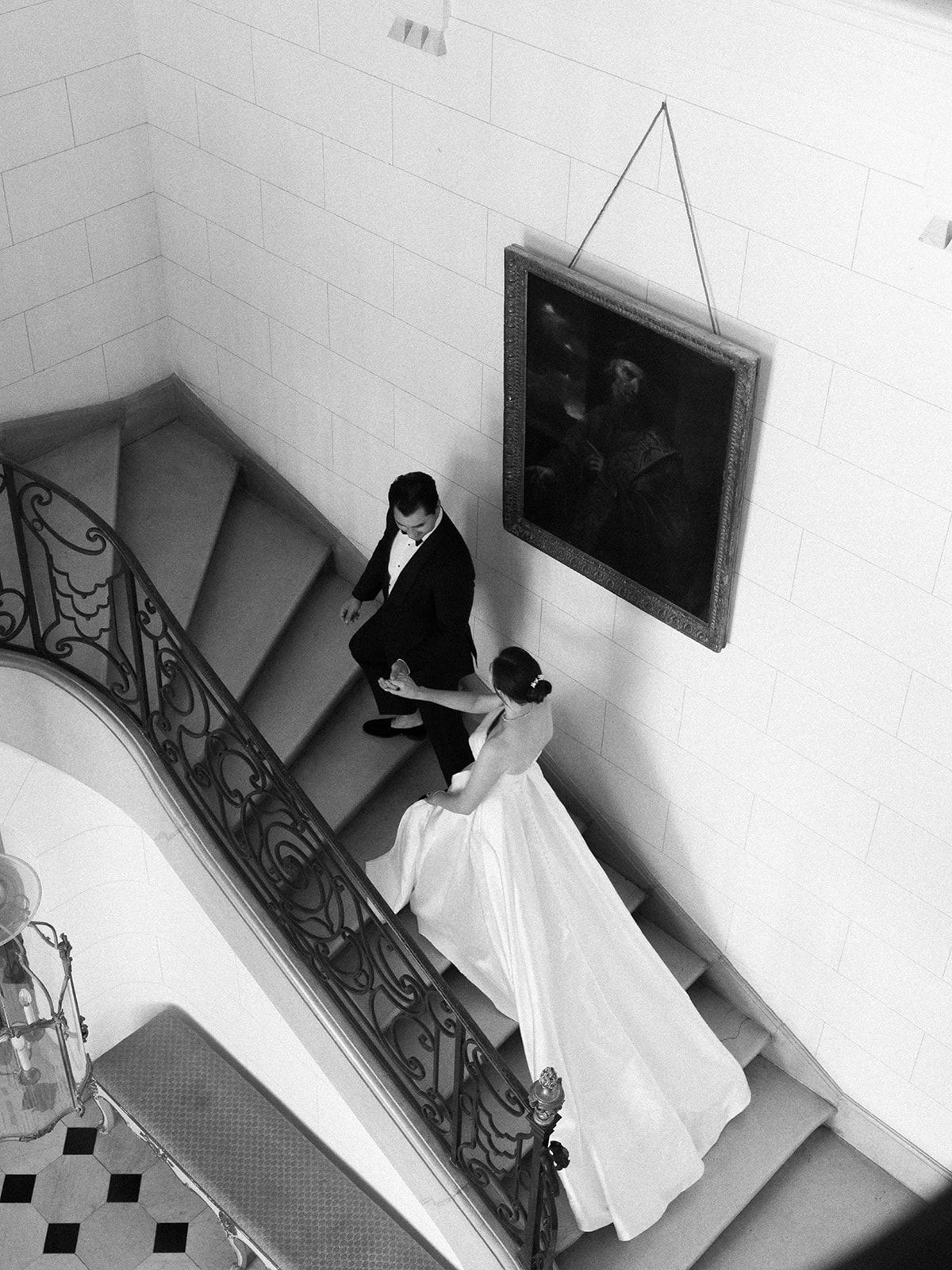 Haley and Tyler on the staircase seen from above