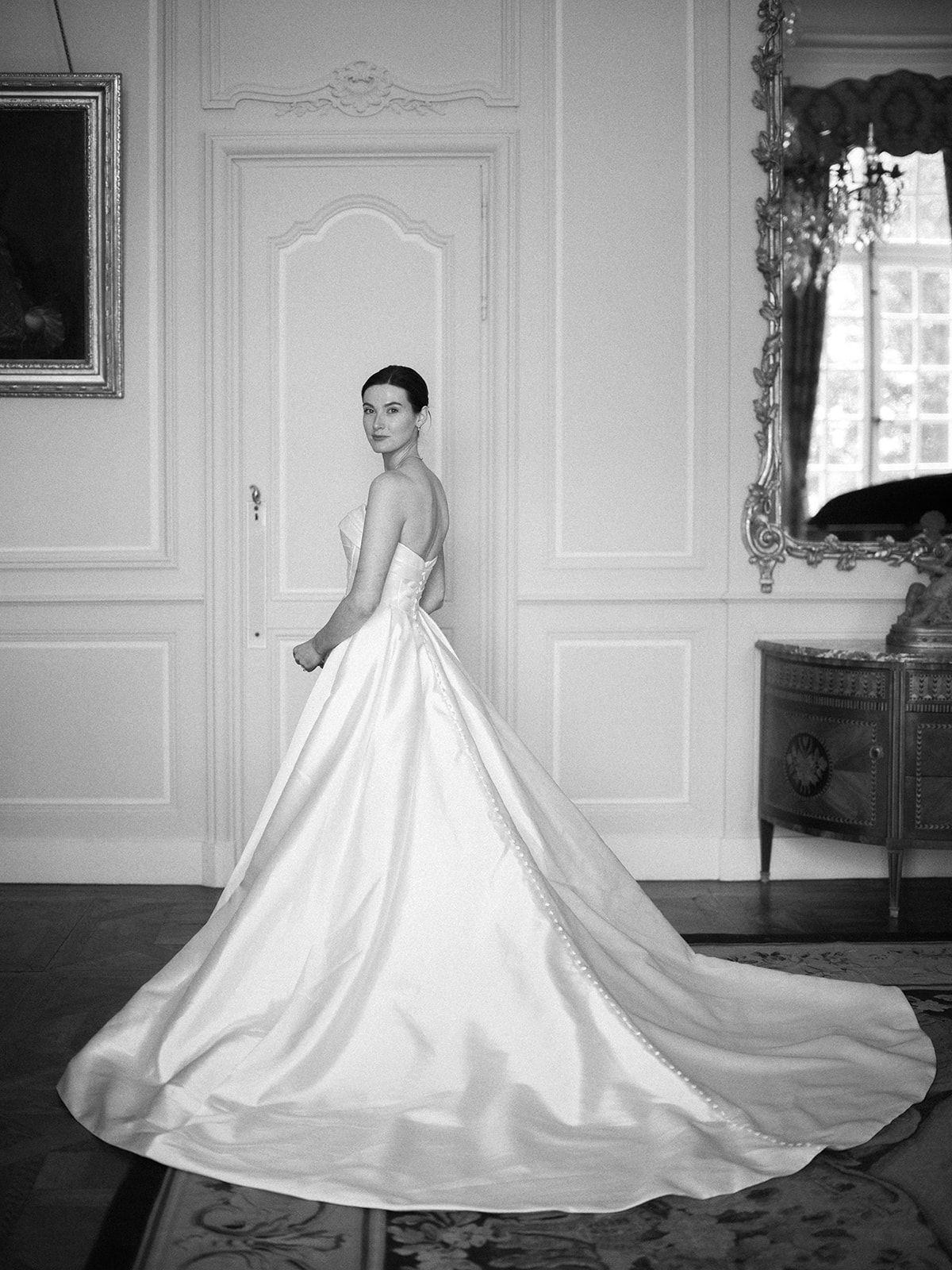 Haley in her strapless gown in a panelled room at La Chassagne