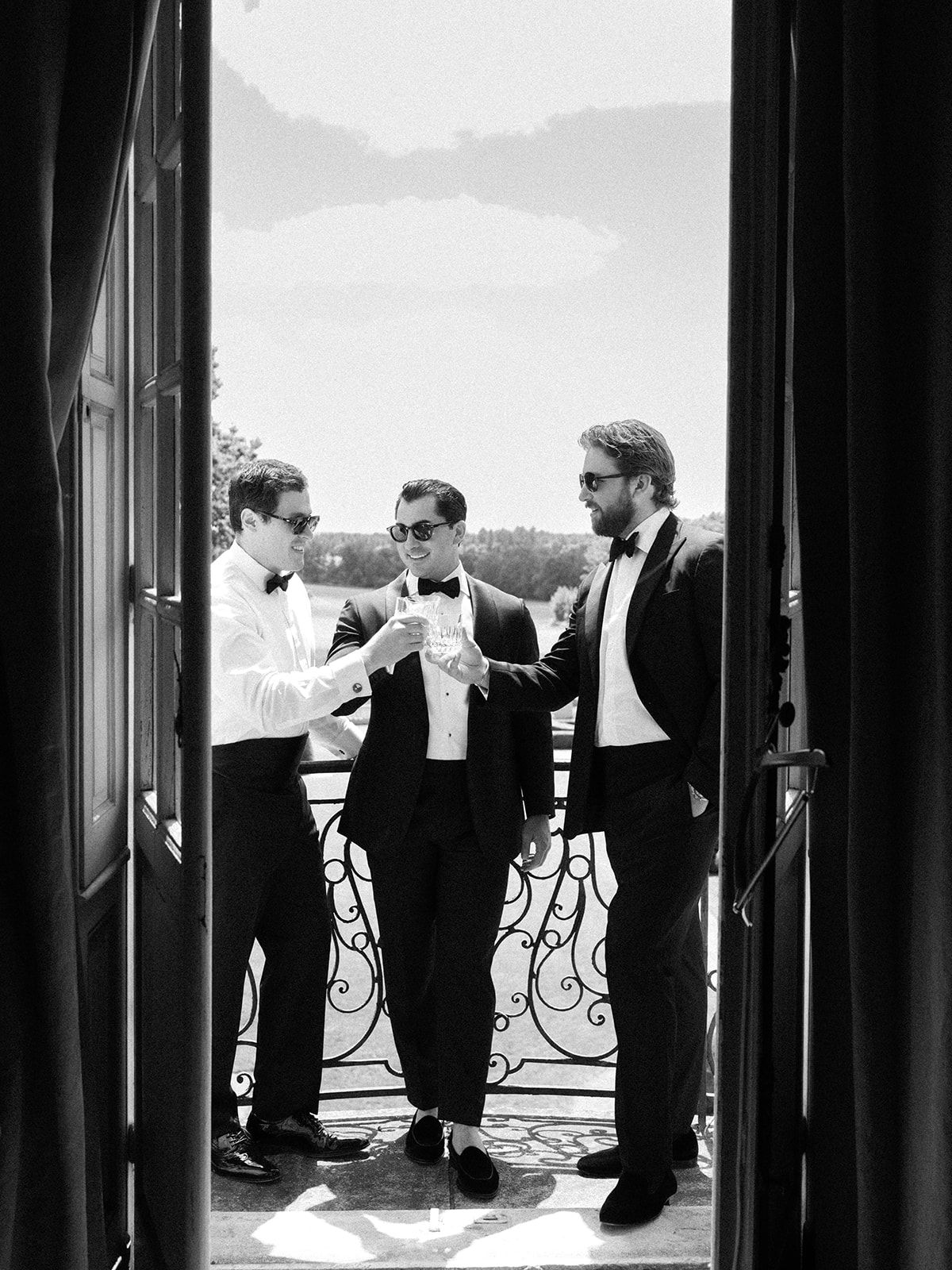 The groomsmen on the balcony before the ceremony