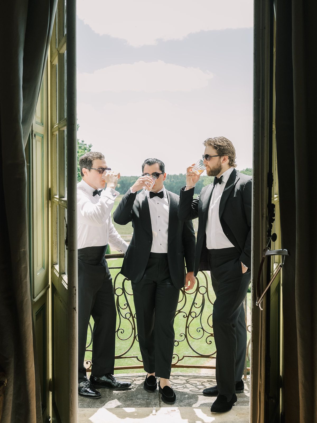 The groomsmen gathered on the balcony at La Chassagne