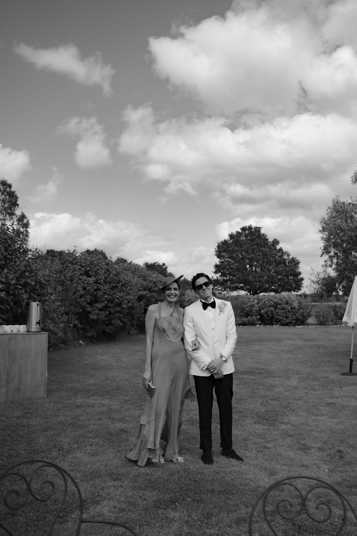 Isadora & Hugo — the couple standing together in the grounds, spring wedding in Nouvelle-Aquitaine