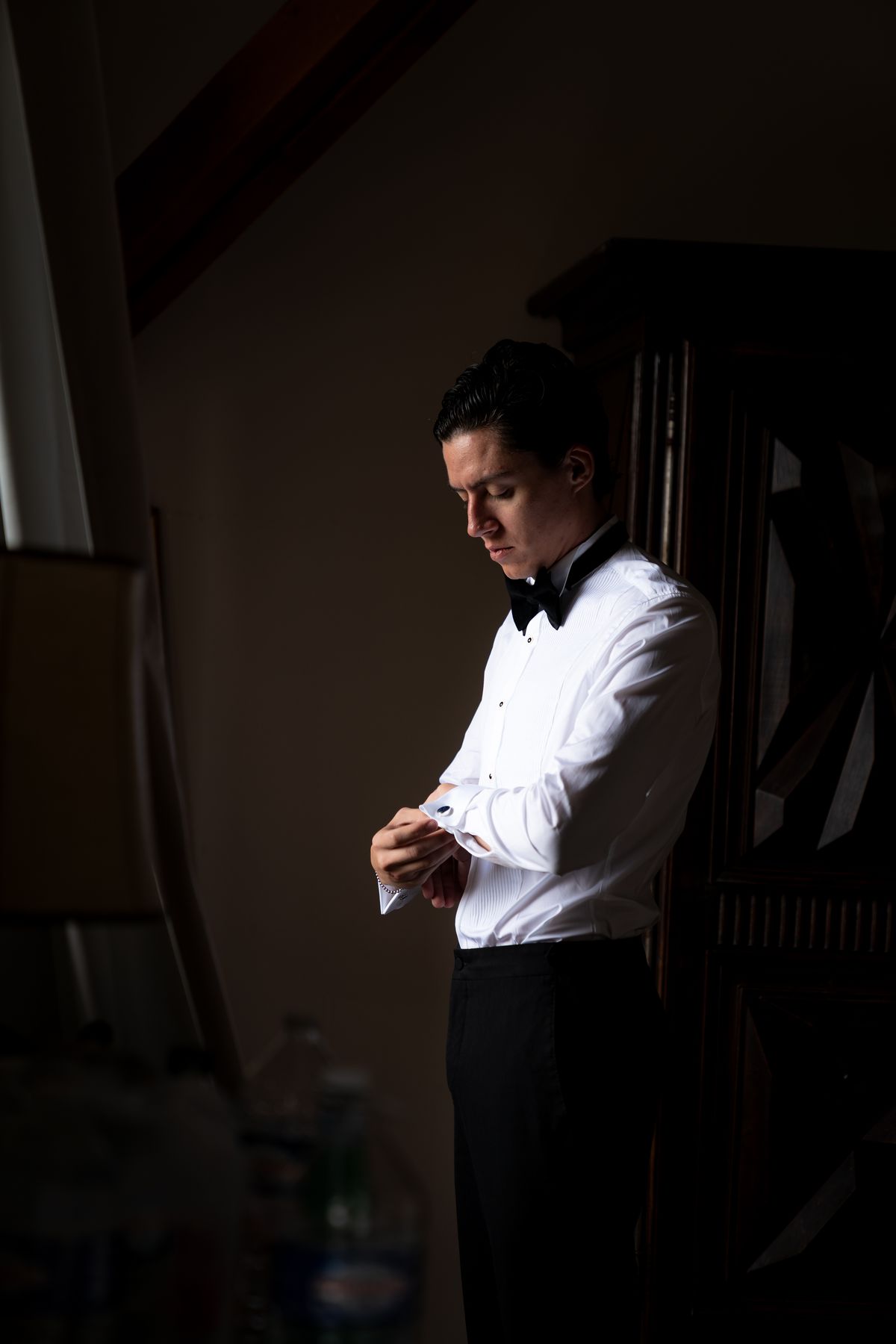 Isadora & Hugo — the groom fastening his cuff, spring wedding in Nouvelle-Aquitaine