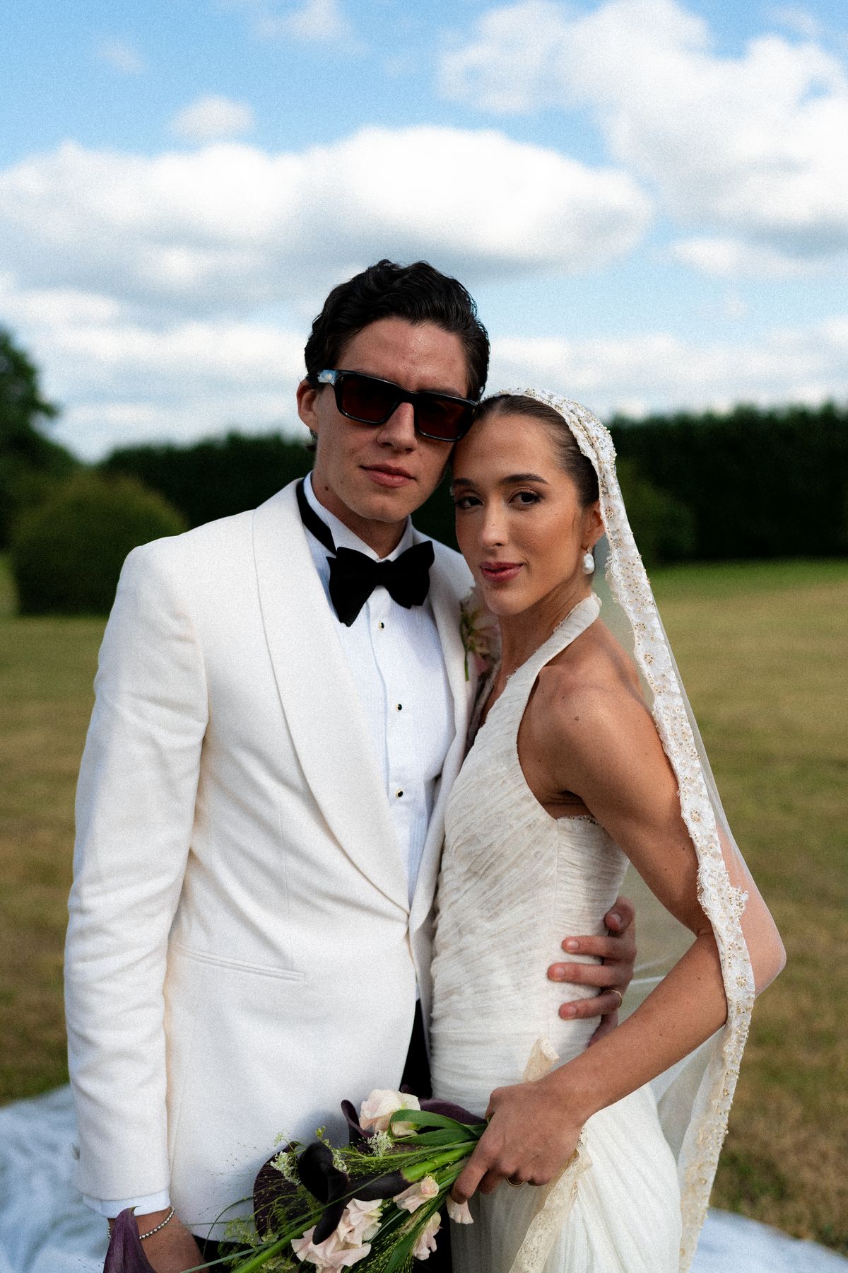 Isadora & Hugo — the couple close together in the evening light, spring wedding in Nouvelle-Aquitaine