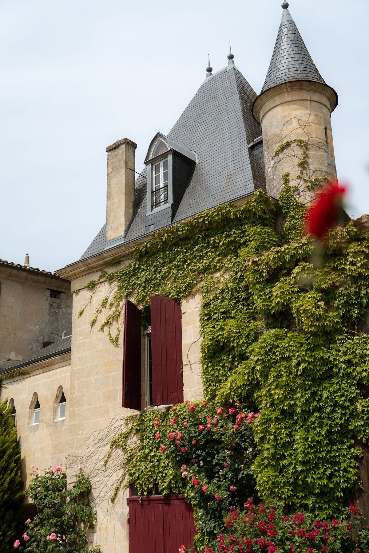 A turret of Château Sentout against the sky