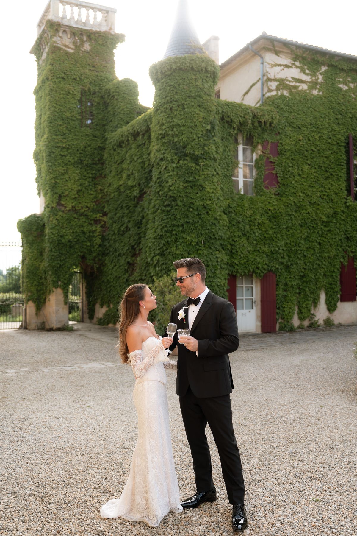 Jori and JD standing together in front of the château