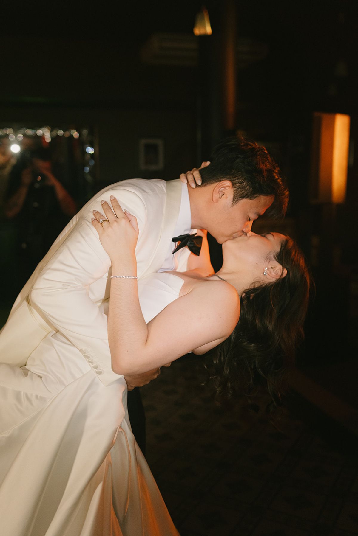 Stefan dipping Carina into a kiss on the afterparty dance floor
