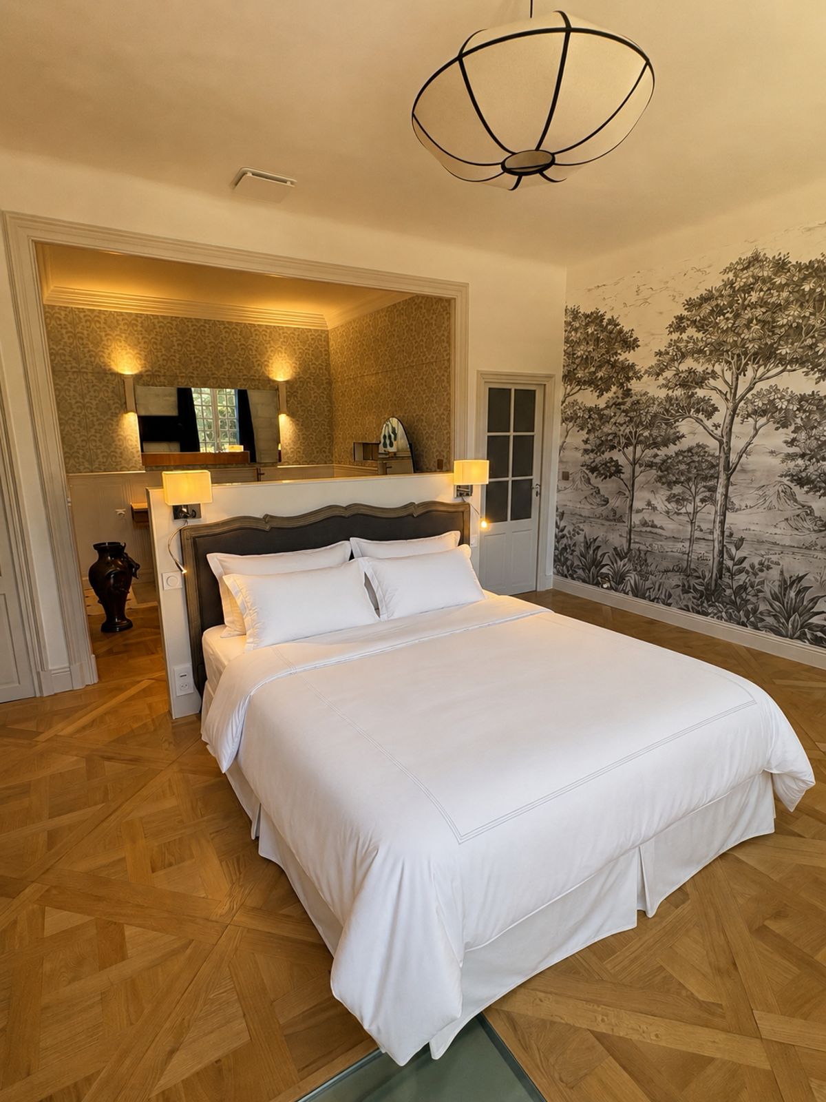 A bedroom suite with dressing area within the château