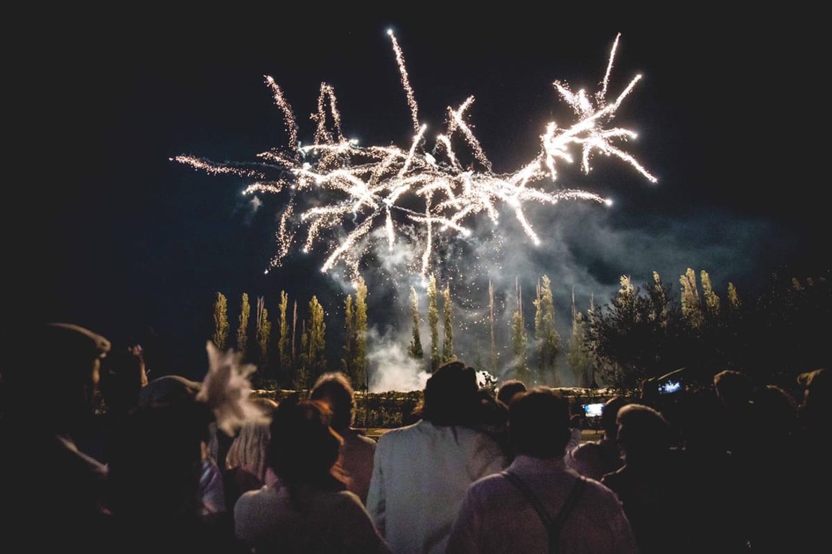 Fireworks over the estate during an evening wedding celebration