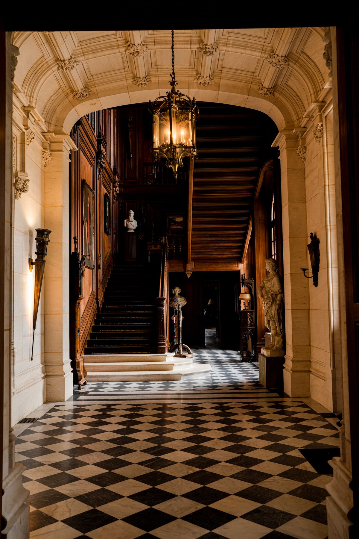 The grand staircase and entrance hall at Château Changeux