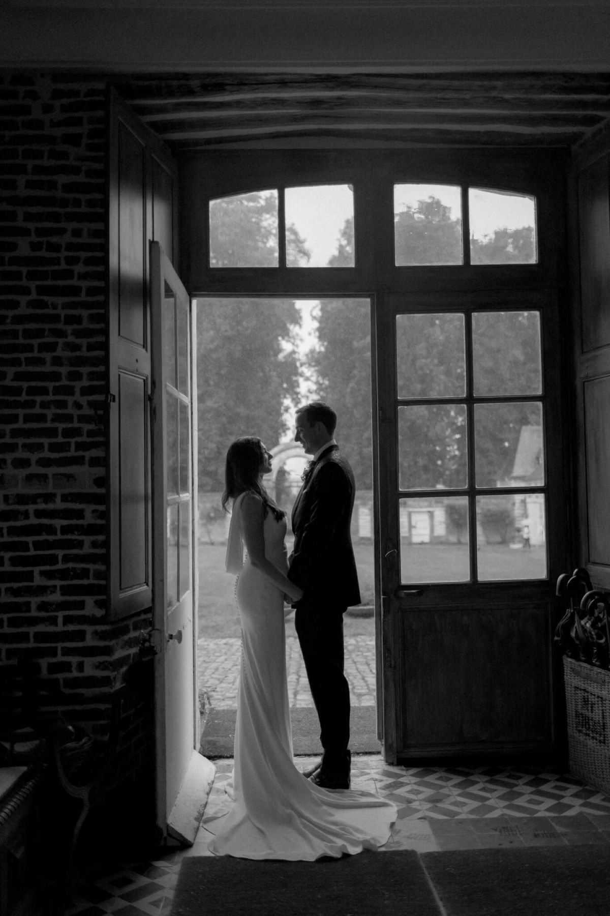 The entrance hall looking out through open doors to the grounds