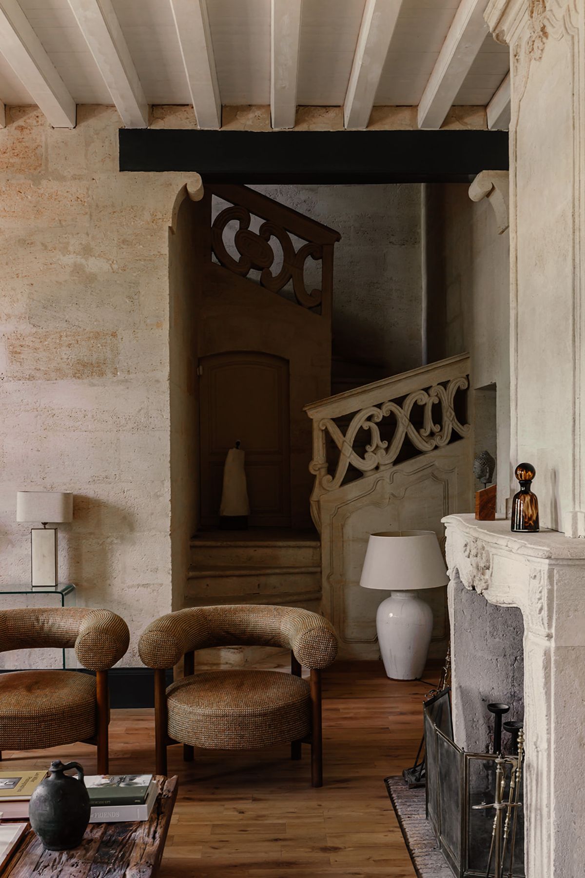 Château de Beaulieu — Entry / salon — spiral stair, fireplace (corrected pick)