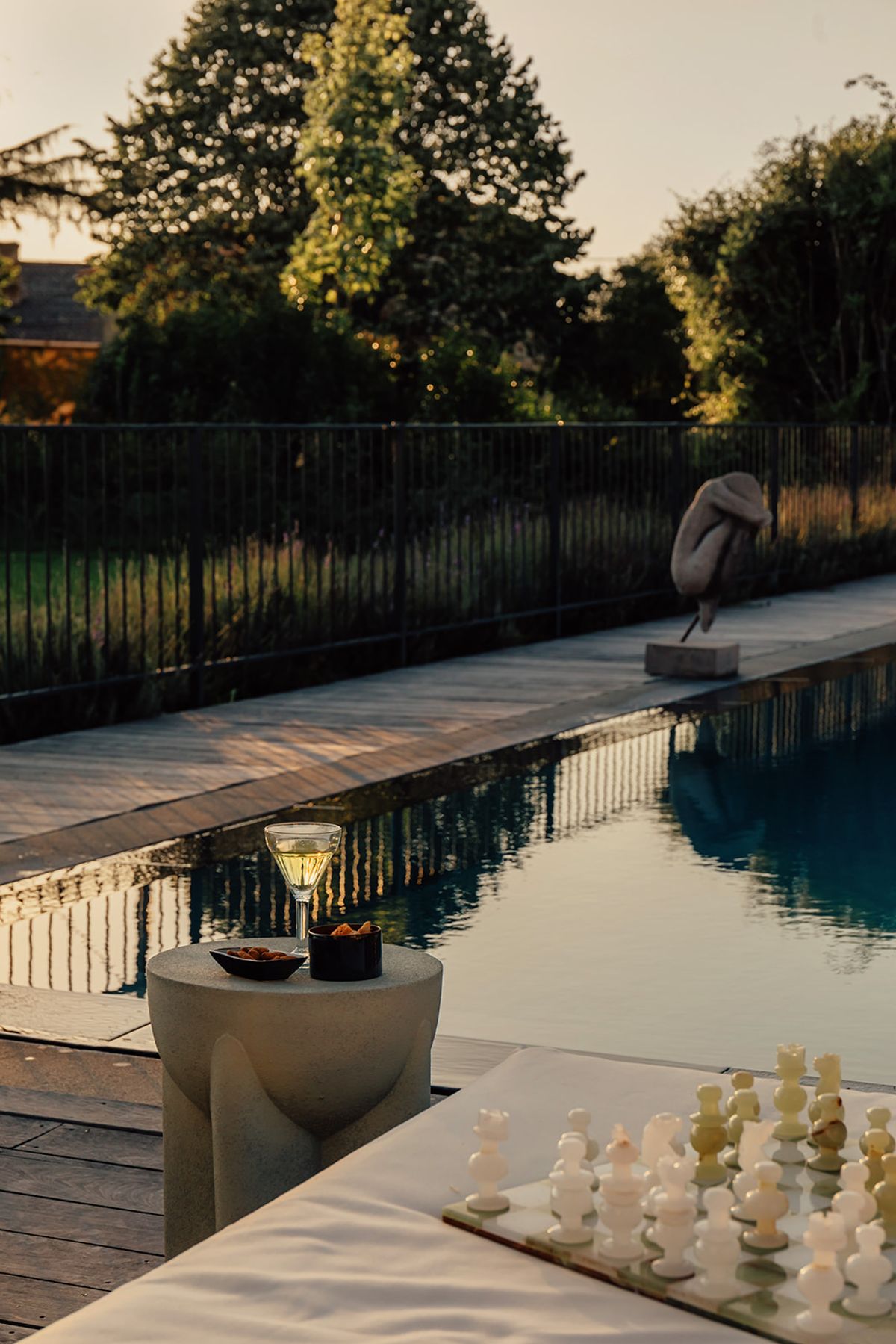 Château de Beaulieu — Pool terrace at dusk