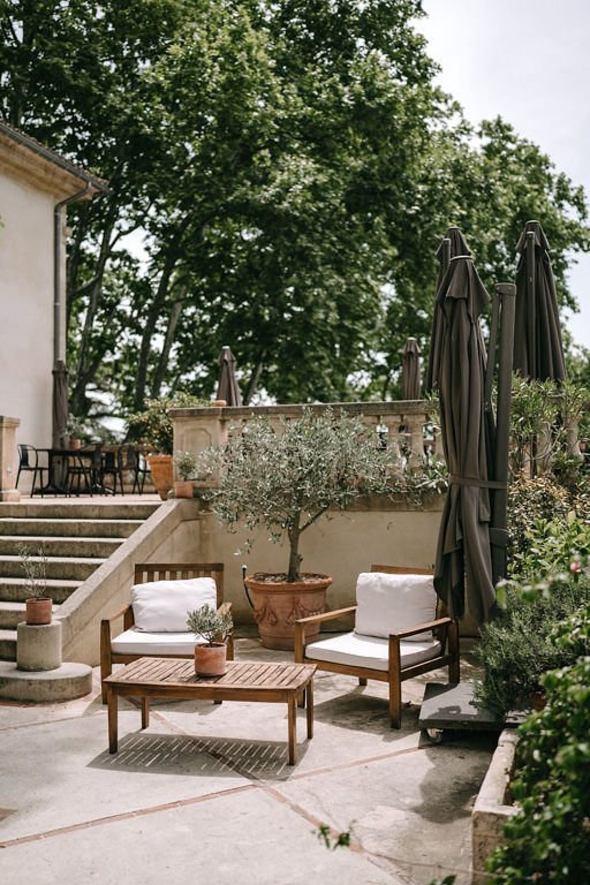 Terrace lounge seating beside the swimming pool