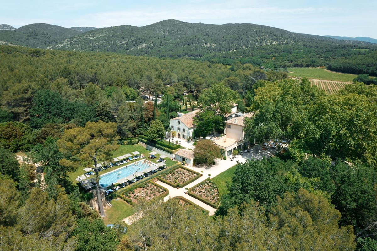 Aerial view of the estate, pool and surrounding hills
