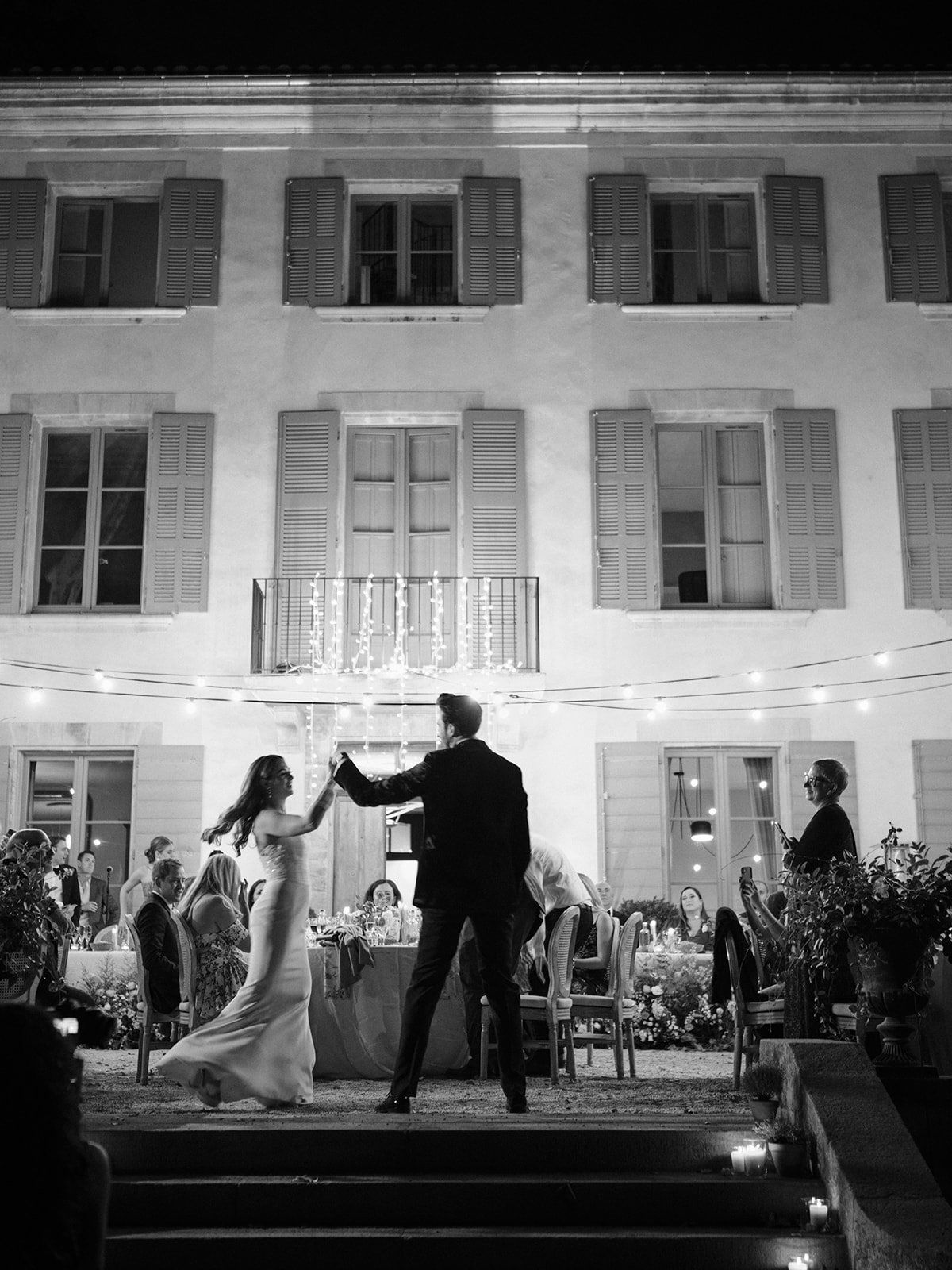 Chateau facade in black and white at dusk