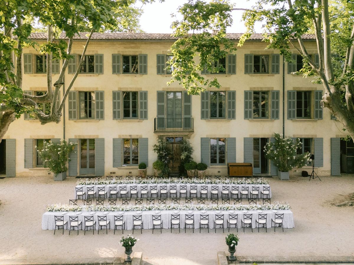 Ceremony seating set in front of the chateau facade