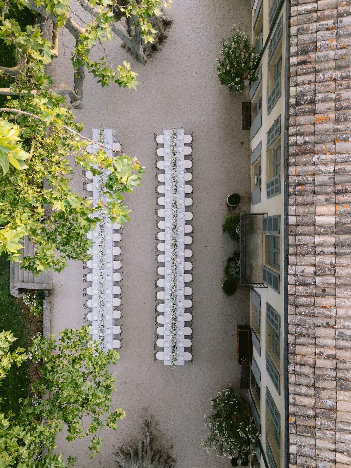 Aerial view of reception tables set in the courtyard