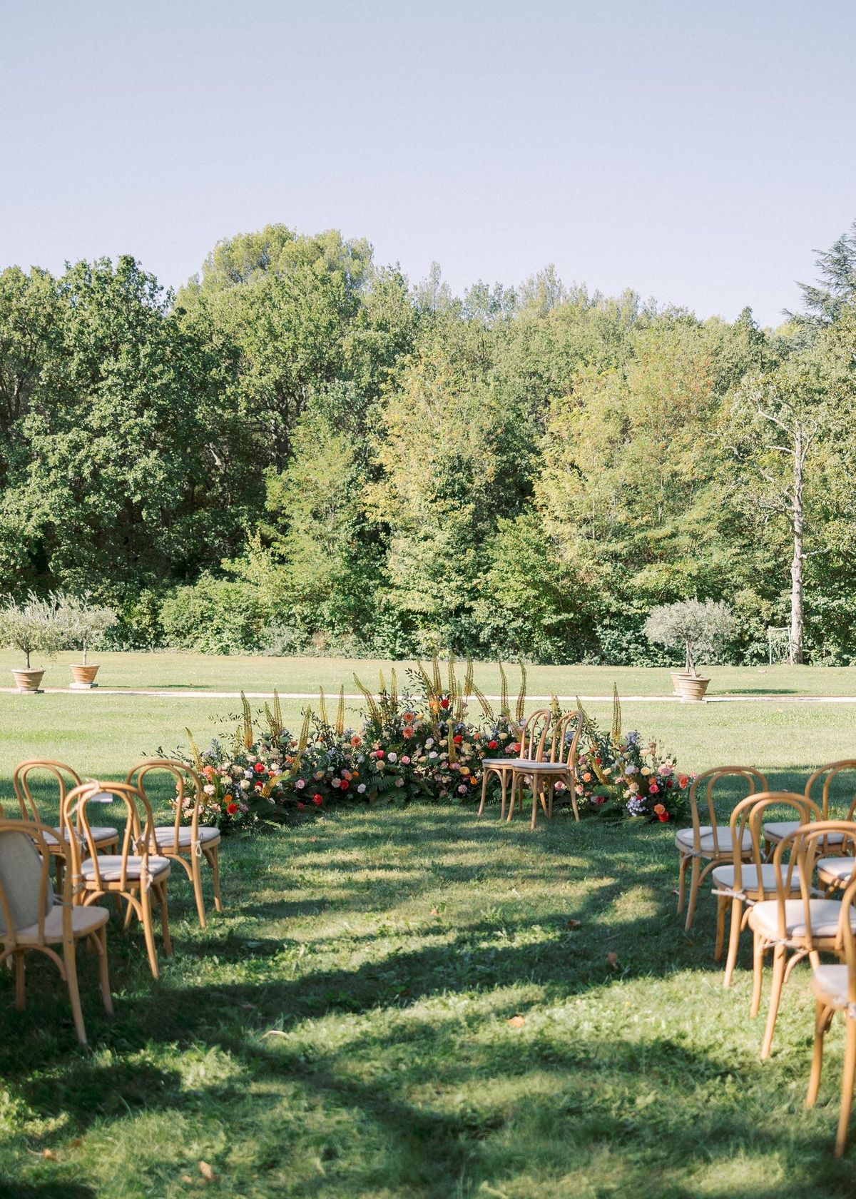 Floral ceremony arch set on the lawn